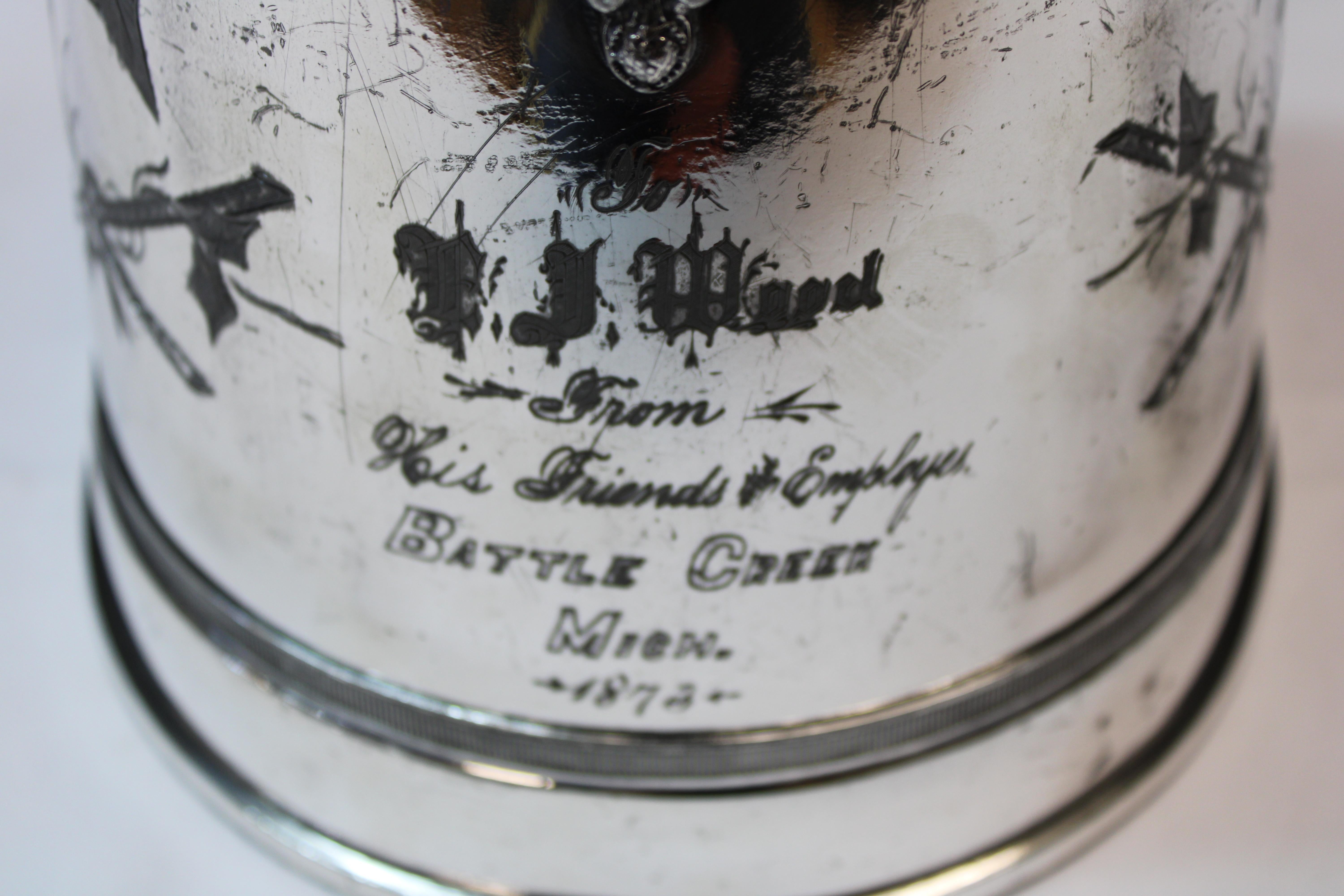 Reed & Barton silverplate water pitcher designed by James Stimpson, 1854. Ornately engraved leaves and inscription—1873. Includes matching silverplate goblet