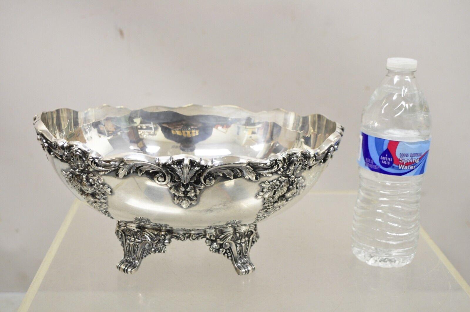 Reed & Barton King Francis 1684 Victorian Style Silver Plated Oval Footed Fruit Serving Bowl. Iem featured is raised on ornate feet, ornate leafy scrollwork, nice oval form, original hallmark, very nice vintage item, great style and form. Circa Mid