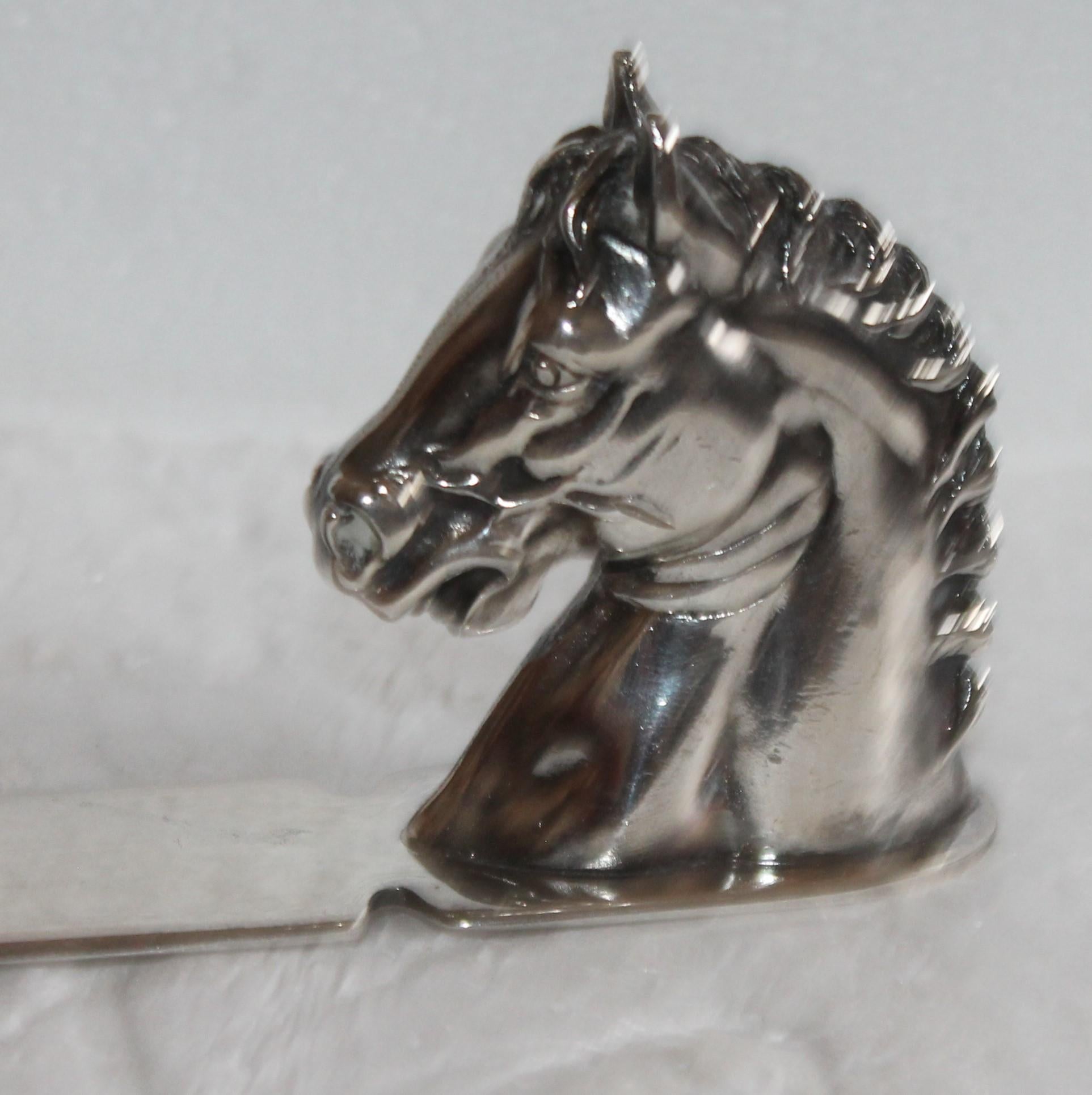 Reed and Barton letter opener in silver plate with a horse head.