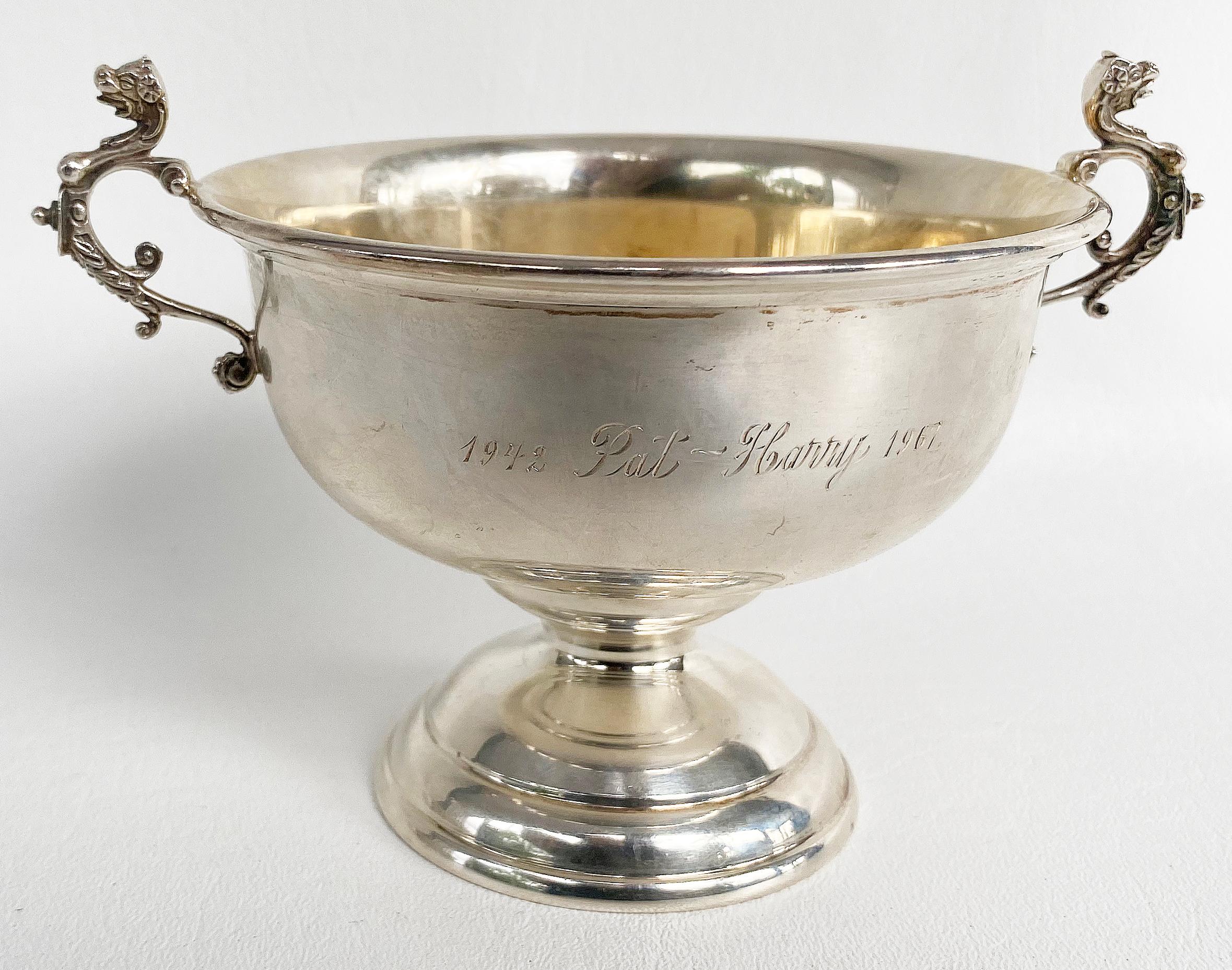 Reed & Barton Sterling Silver Engraved Anniversary cup trophy

Offered for sale is a 1967 engraved sterling silver handled anniversary loving cup trophy. The cup is marked under the base and the interior of the bowl has a gold wash. The cup is