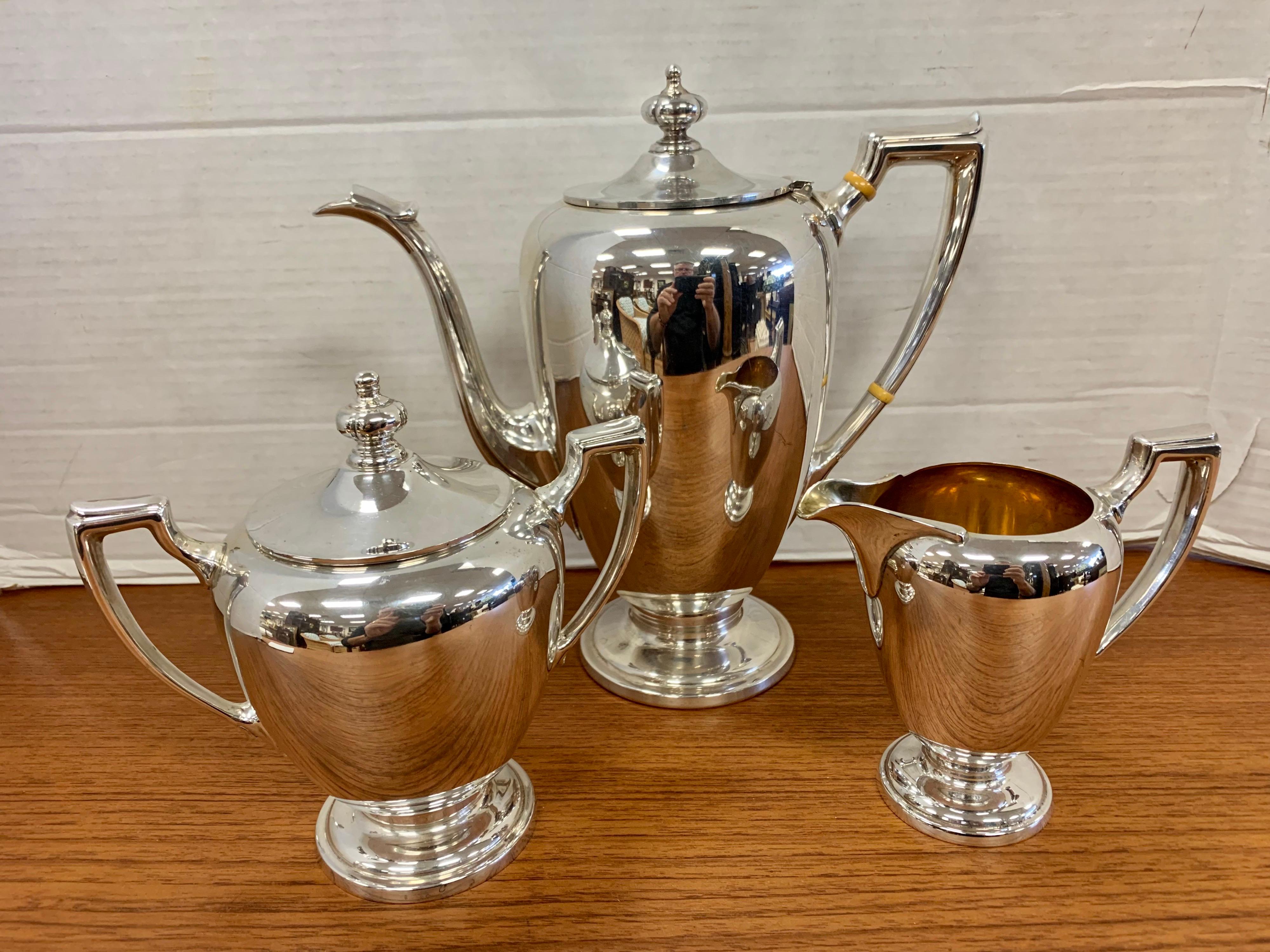 Stunning, Reed & Barton sterling silver tea set with no monograms. Three matching pieces in all.
Dimensions below are for the largest piece, the coffee/tea pot. The great Gio Ponti designed some
of Reed & Barton's sterling collection. These pieces