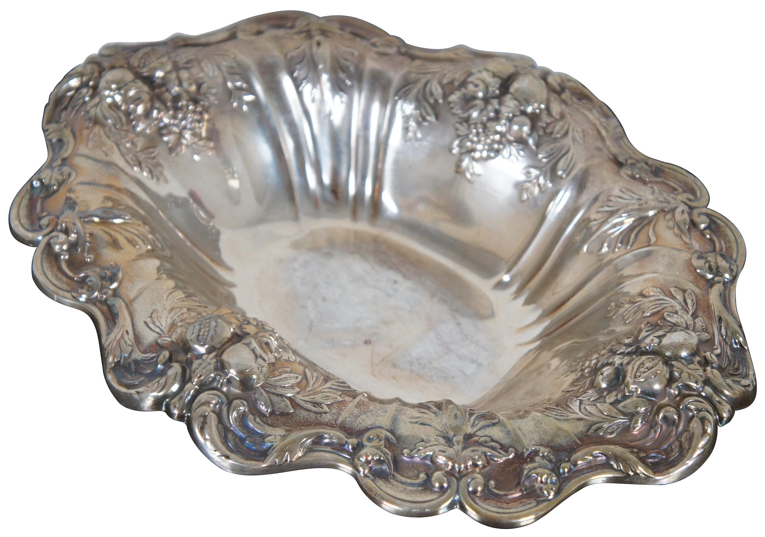Vintage Reed and Barton X566F Francis I sterling silver 925 oval footed serving centerpiece dish or bowl with scalloped edge decorated with fruit and flowers. Measures: 13