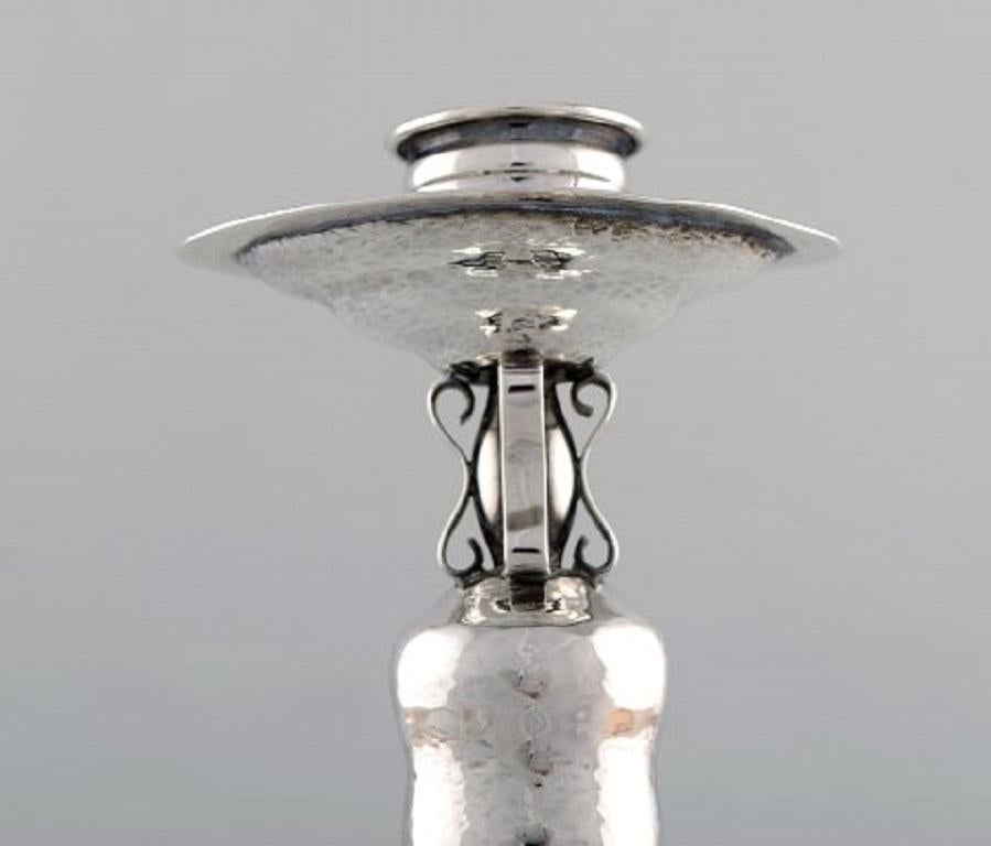 Mid-20th Century Reed & Barton, USA a Pair of Candlesticks in Hammered Sterling Silver circa 1930