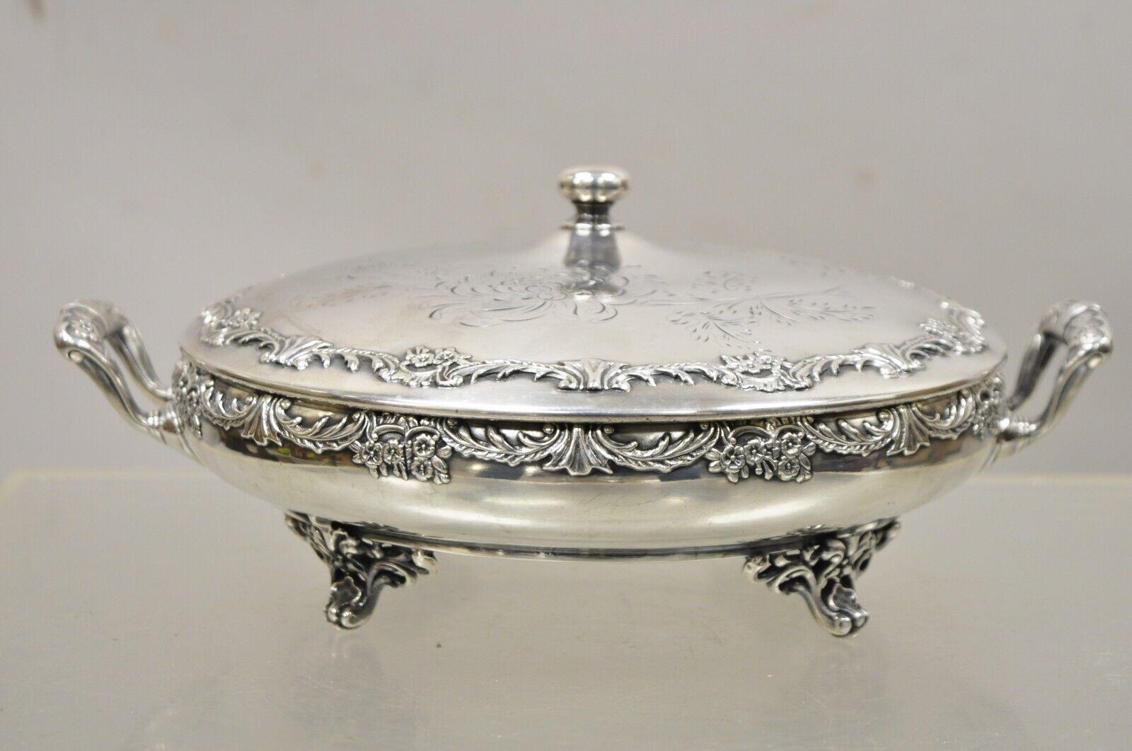 Reed & Barton Victorian Silver Plated Round Lidded Twin Handle Serving Dish. Item features an ornate lid, twin handles, raised on fancy feet, very nice antique item, quality English craftsmanship, great style and form. Circa Early to Mid 1900s.