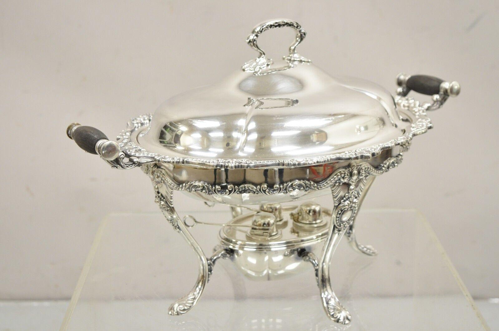Vintage Reed & Barton Victorian Style Silver Plated Warming Serving Chafing Dish with Triple Burners. Circa Mid to Late 20th Century. Measurements: 11
