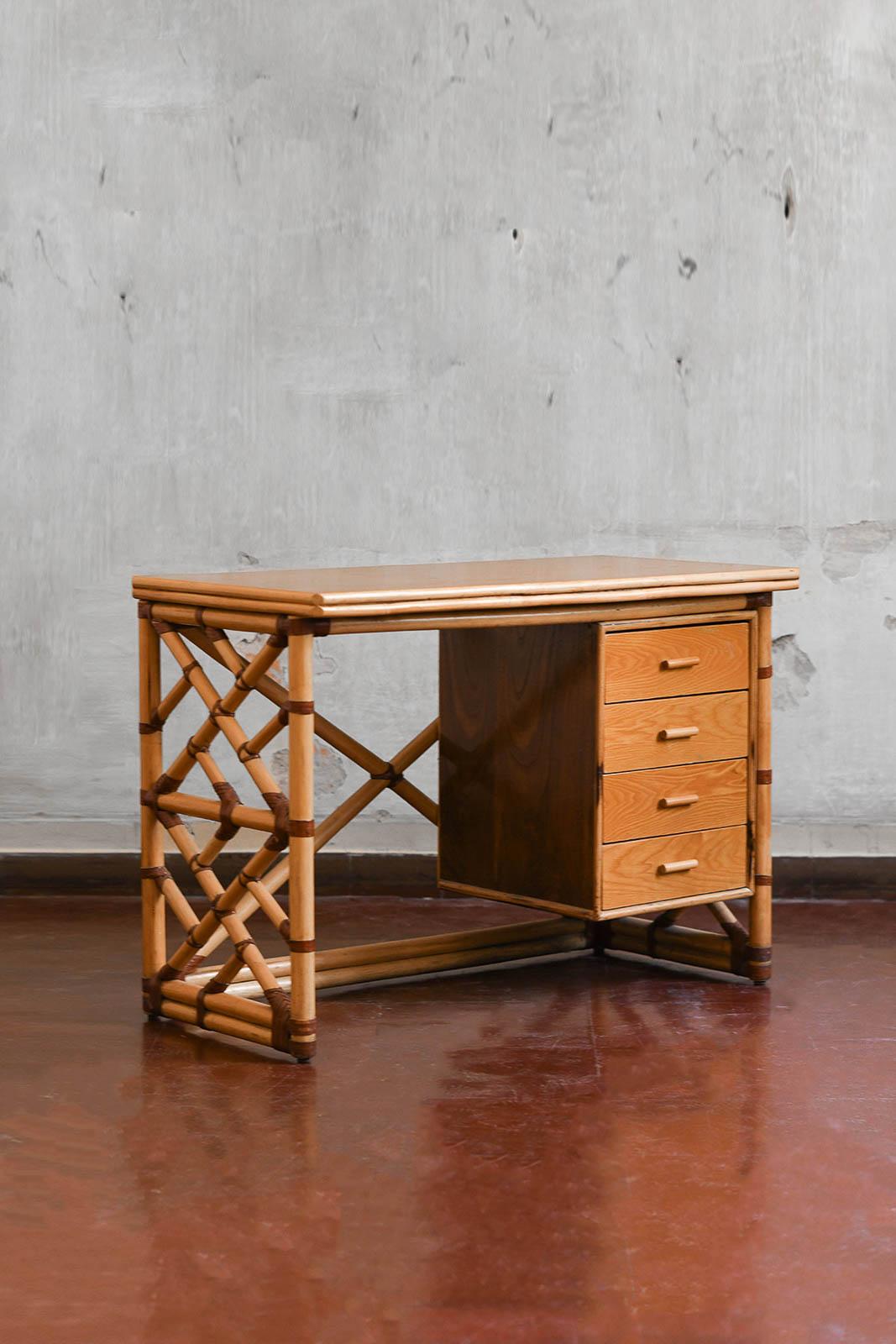 Reed desk with wooden shelf, drawers and leather bindings, 1970s.
Product details
Dimensions 110 W x 78 H x 55 D cm