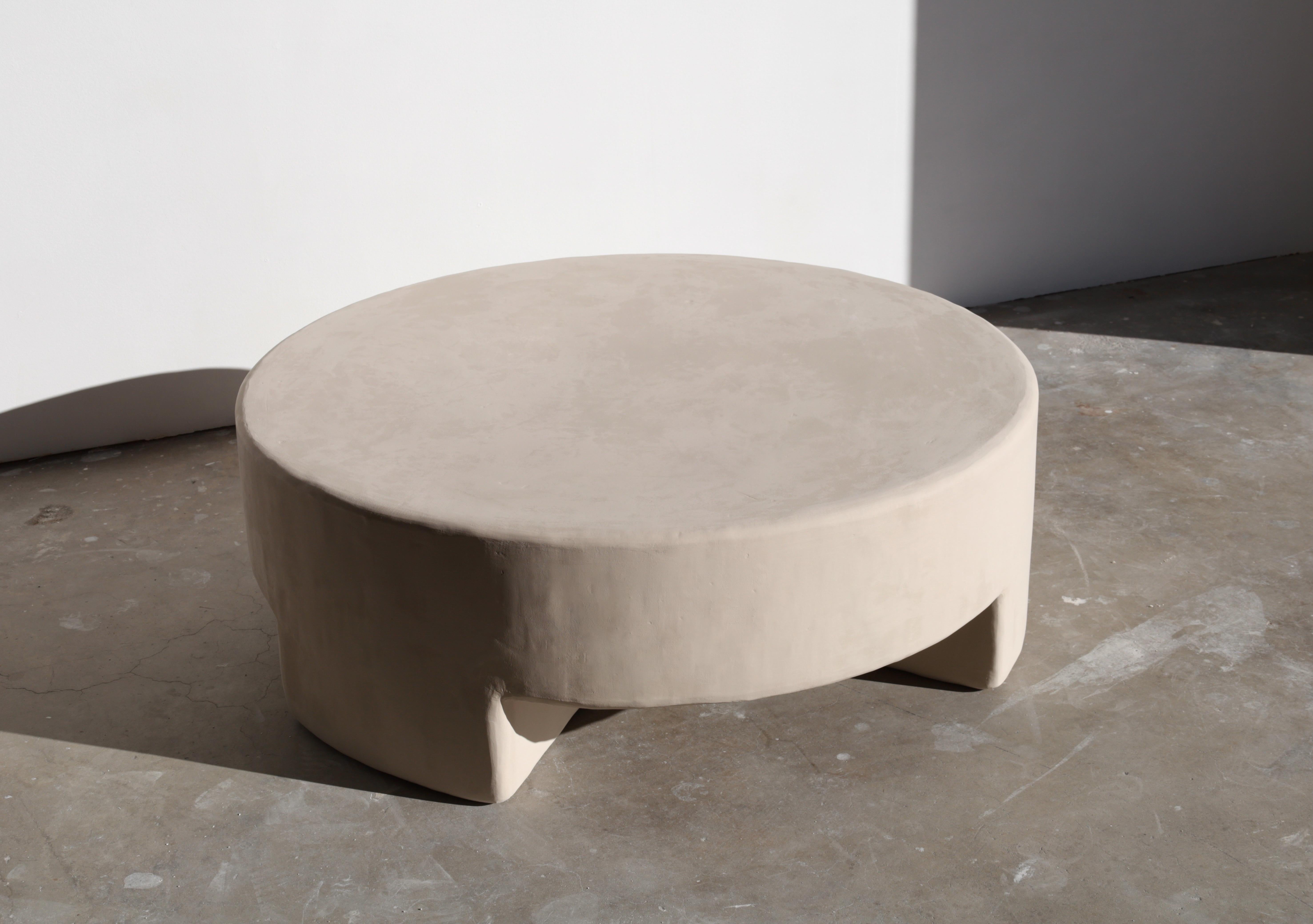 plaster round coffee table
