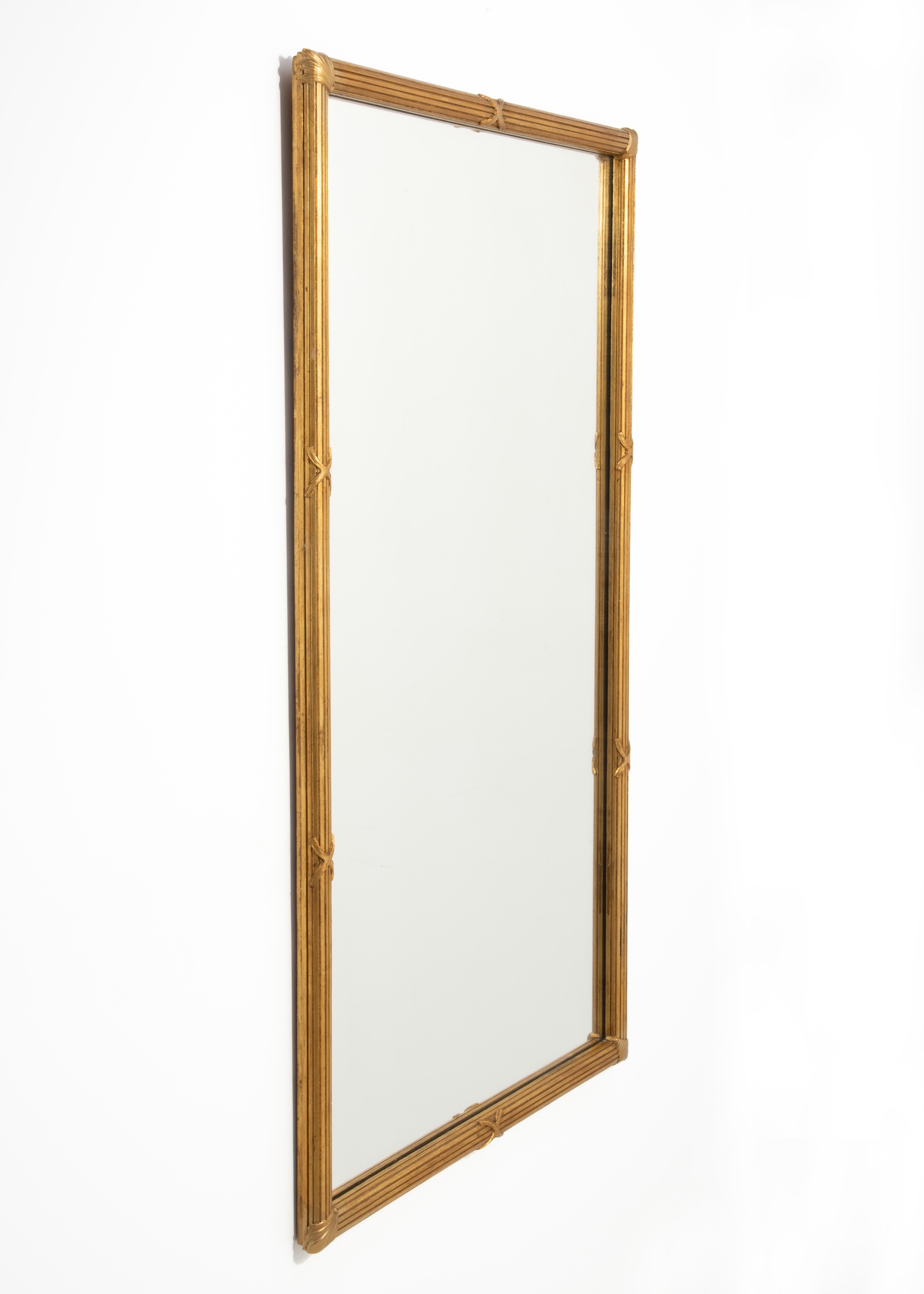 This is one of a closely matching, but not identical pair of Neoclassical wall mirrors from of a Bucks County, PA estate. The mirrors were displayed opposite each other, in the same room, not side by side. The last two images show the two mirrors