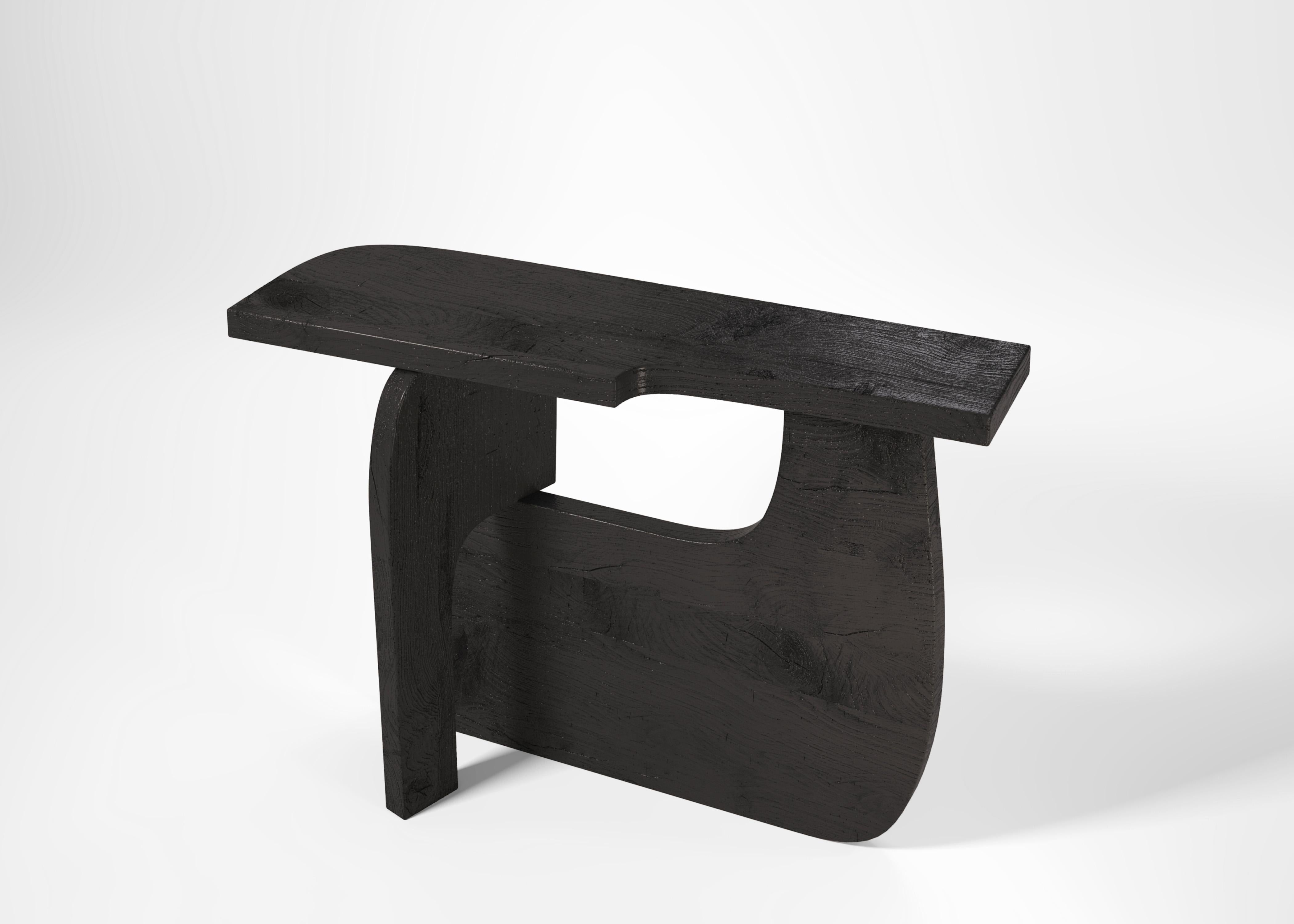 Reef console in charred wood by Edizione Limitata.
Limited Edition of 150 pieces. Signed and numbered.
Designers: Simone Fanciullacci.
Dimensions: H 90 × W 40 × L 130 cm.
Materials: Charred wood.

Edizione Limitata, that is to say “Limited Edition”,