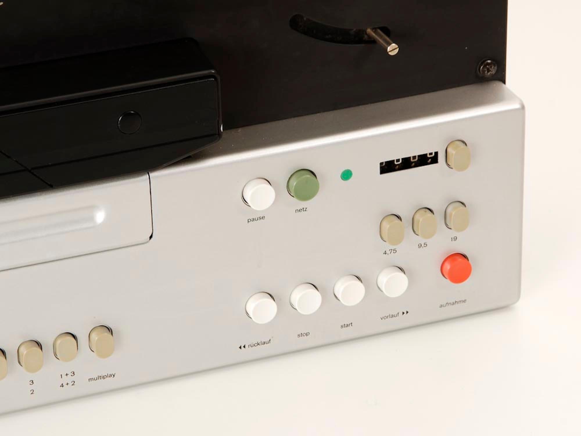 Reel to Reel TG1000 tape recorder by Dieter Rams for Braun, 1974.
Silver finish, 4-lane, speeds 4,75 / 9,5 + 19 cm / s, 3 heads, 3 motors, max. 22 he coil size. With microphone and headphone connections.

Specifications
Track system: 4-track,