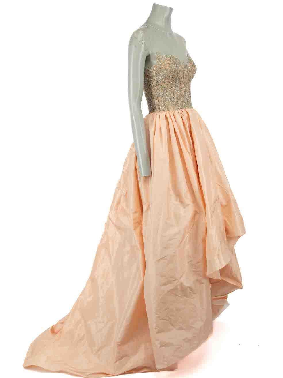 CONDITION is Very good. Hardly any visible wear to dresses is evident on this used Reem Acra designer resale item.
 
 Details
 Pink
 Silk
 Gown
 Sheer sleeveless top
 Embellished bodice
 High low skirt
 Side zip fastening
 Puffy skirt
 
 
 Made in