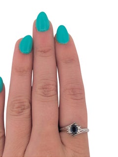 Reese  Platinum Ring with .62 ct Oval Natural Sapphire & .10 ctw Diamonds