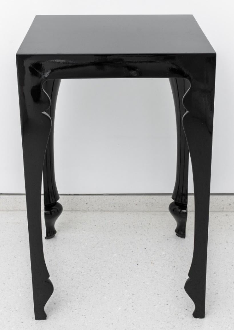 Reeves Design Baroque revival black lacquered square end table raised on tapered legs, 