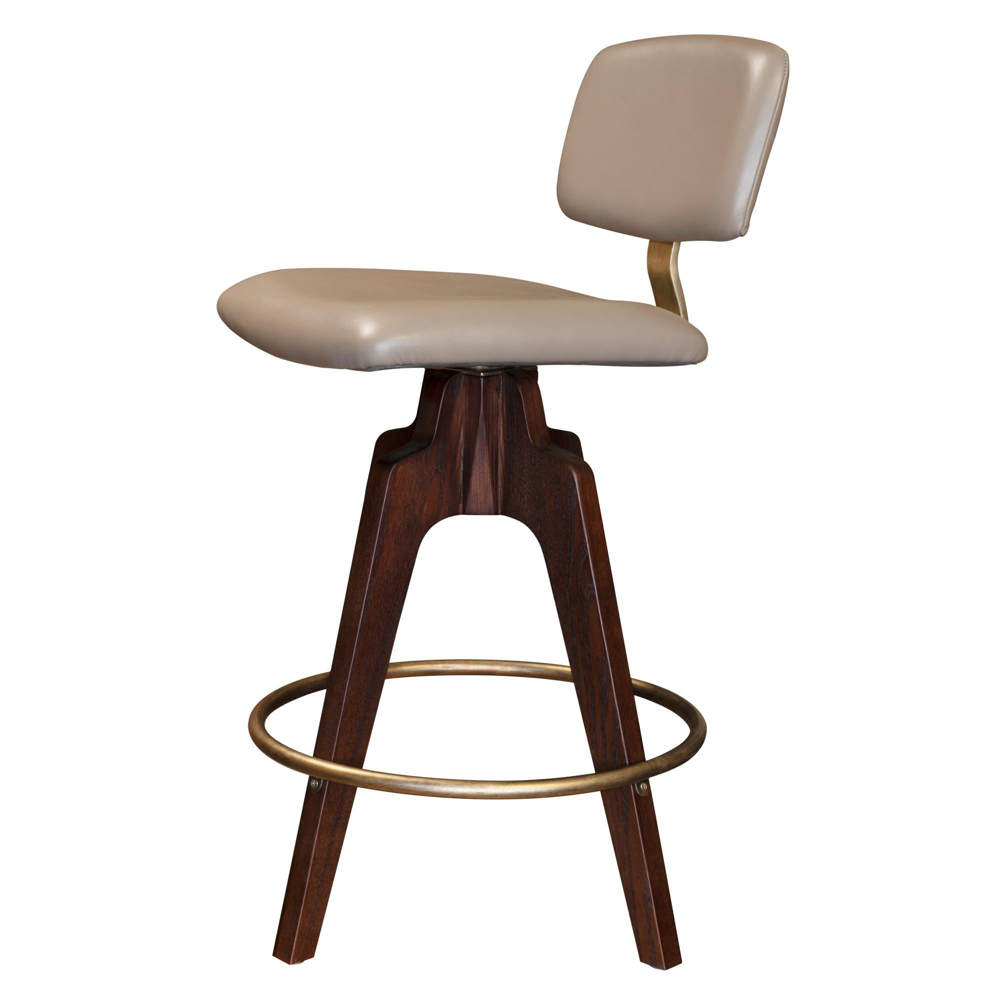 Contemporary Reeves Swivel Bar Stool W/ Ash legs stained Walnut, Leather & Brass Finish.  For Sale