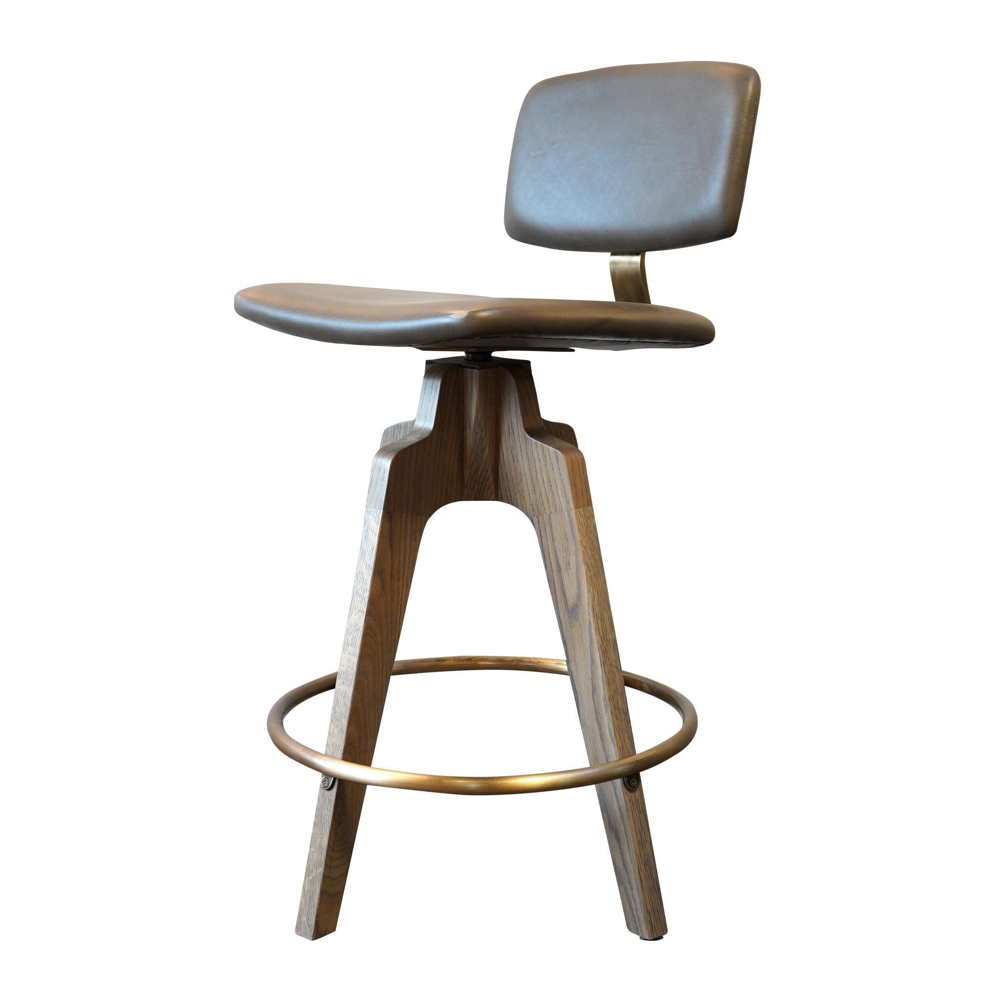 Reeves Swivel Bar Stool W/ Ash legs stained Walnut, Leather & Brass Finish.  For Sale 1