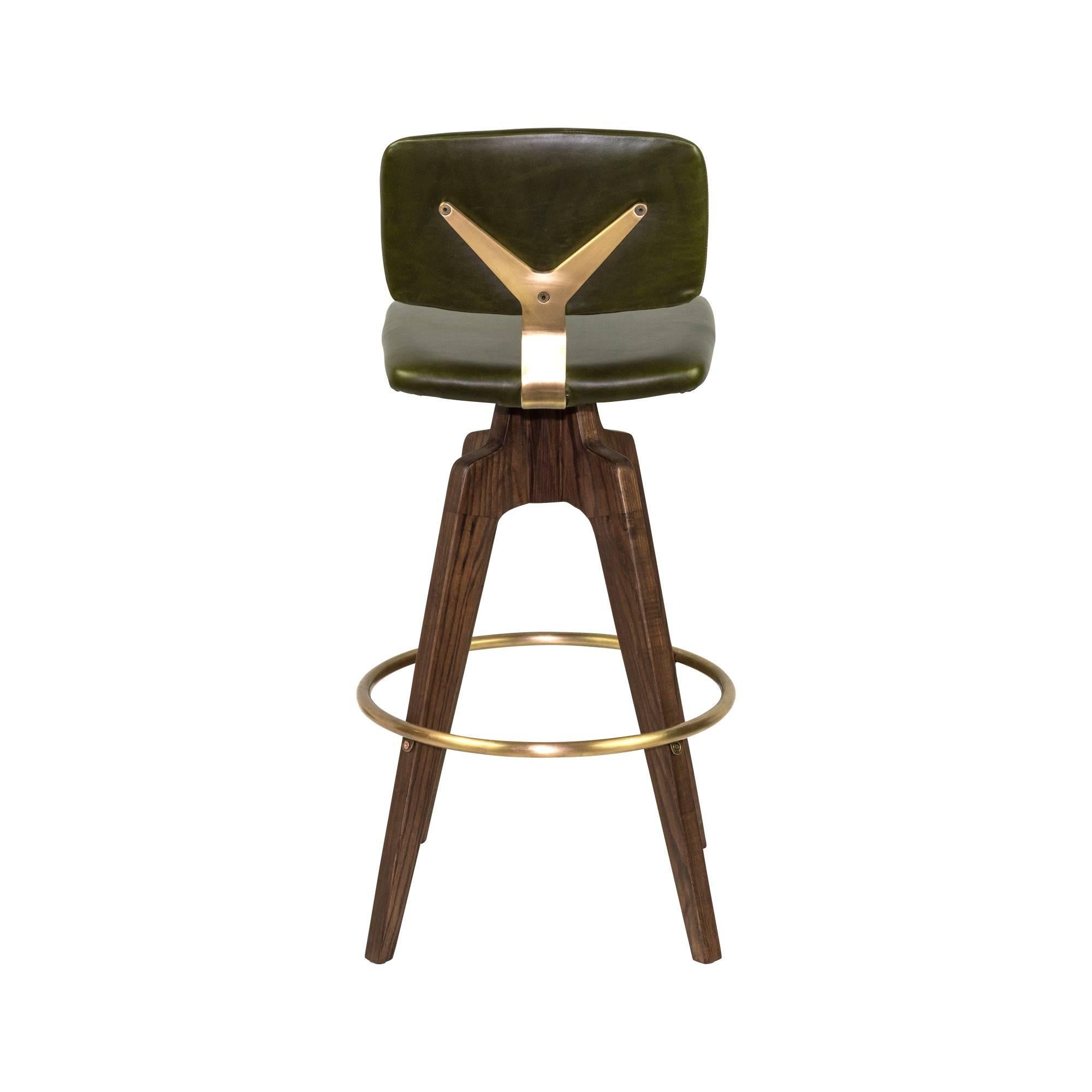 Modern Reeves Swivel Bar Stool W/ Ash legs stained Walnut, Leather & Brass Finish.  For Sale
