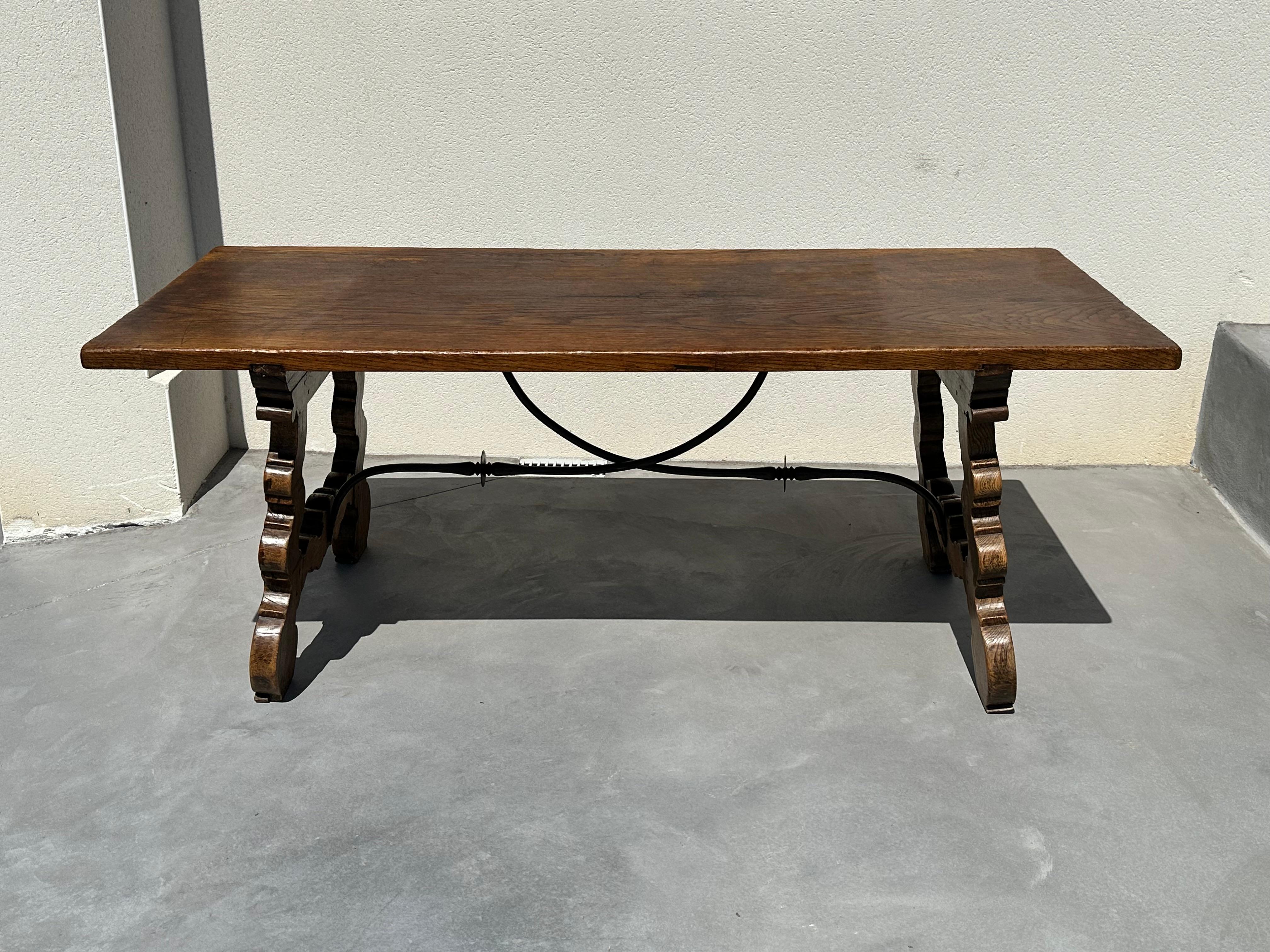 Spanish Colonial Refectory regionalist table, solid walnut and wrought iron. 19th century, Spain For Sale
