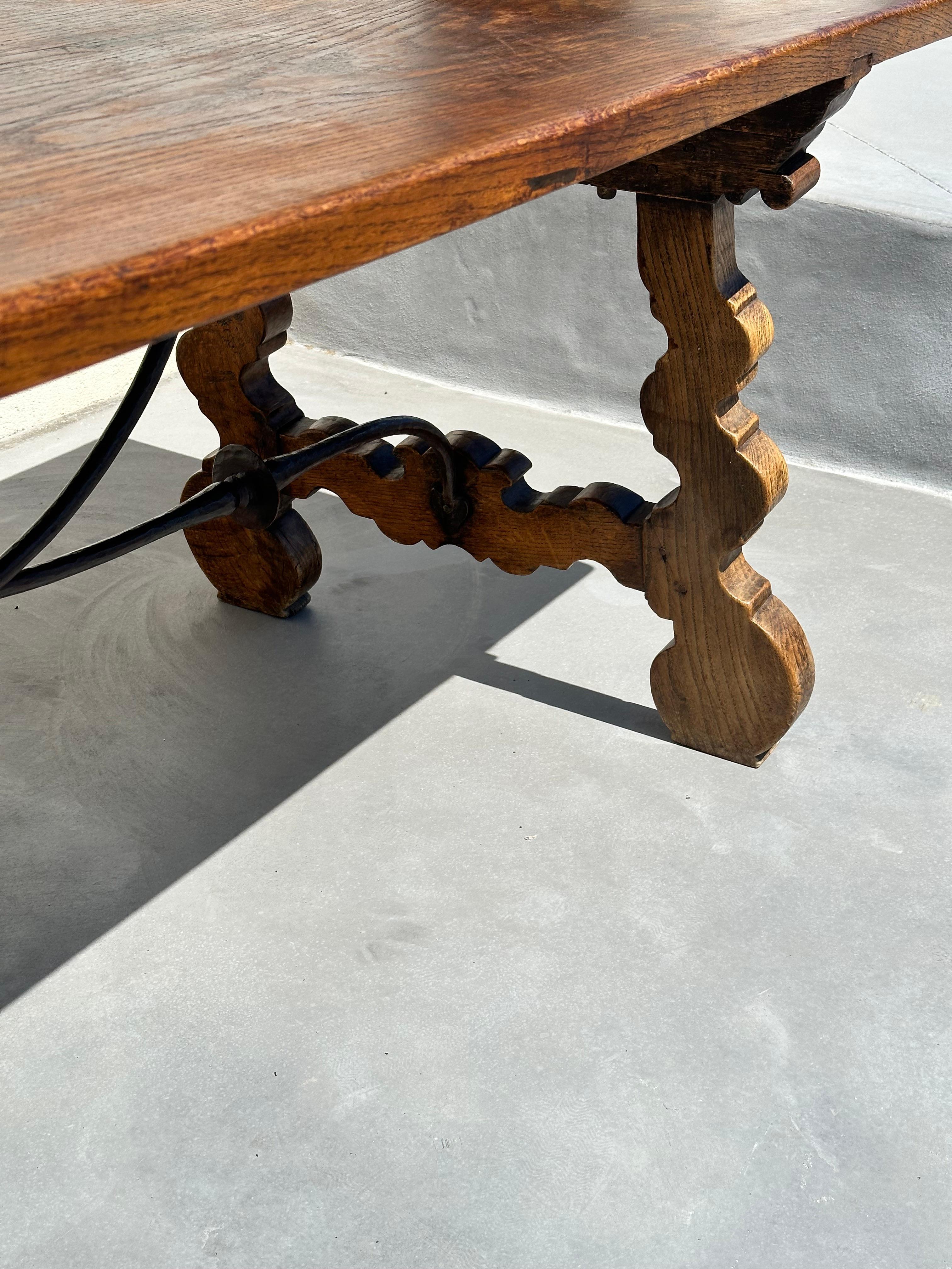 Wrought Iron Refectory regionalist table, solid walnut and wrought iron. 19th century, Spain For Sale