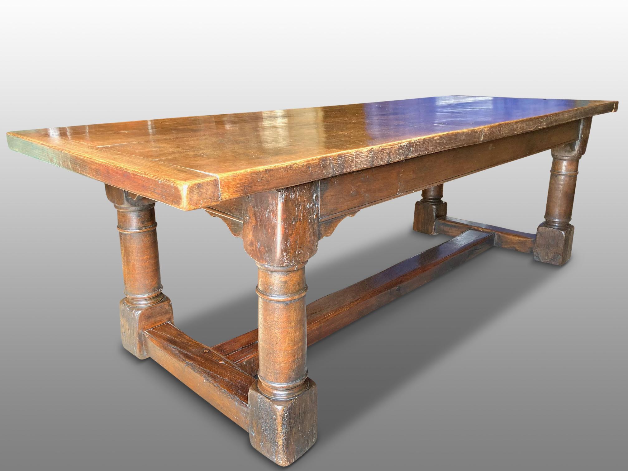 Large oak refectory dining table dating to the circa 1890s.
This is a great size family dining table seating up to 10 people. The top is constructed
of 4 thick planks and cleated at the ends. There is a good overhang for setting in the chairs. The