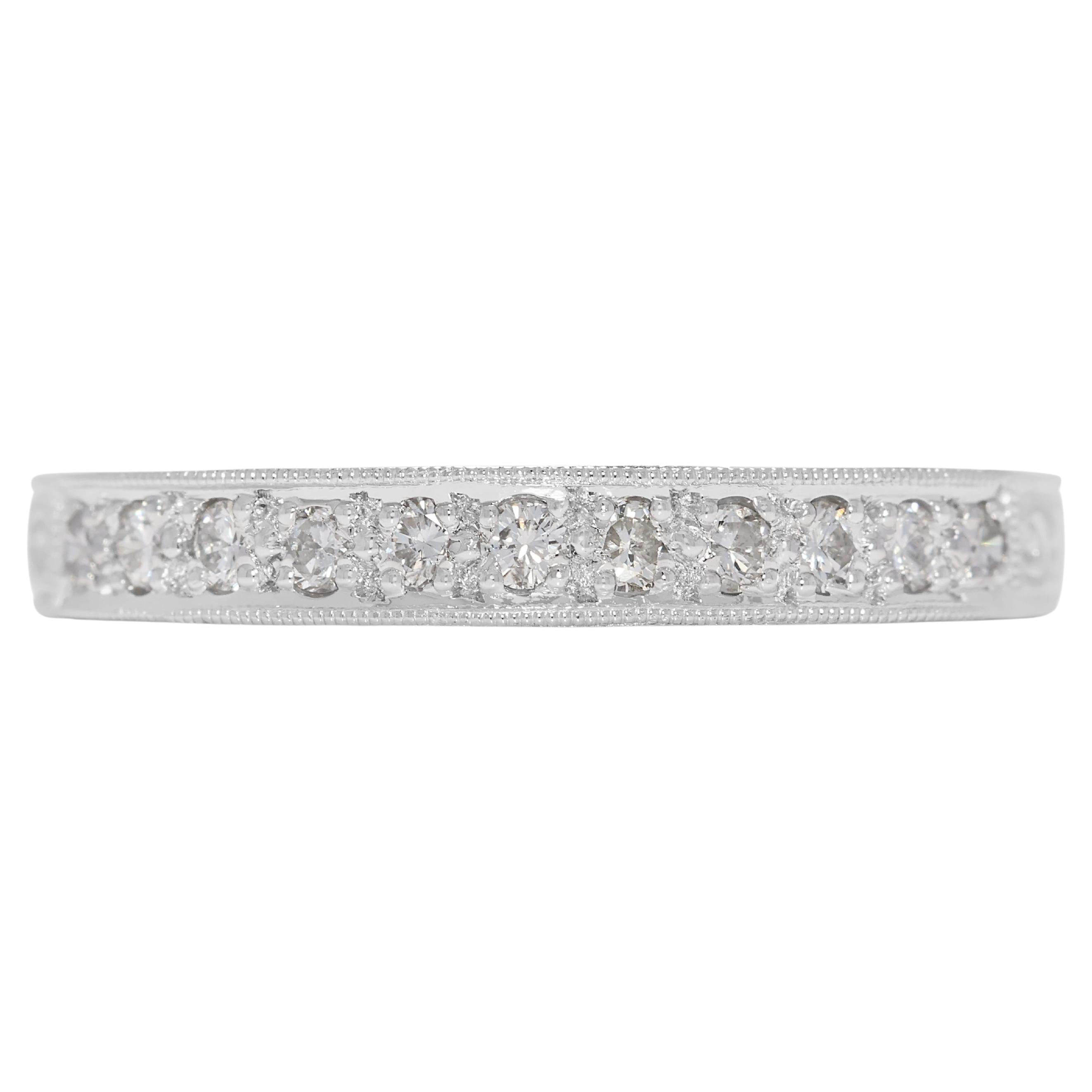 Raffinato anello a fascia in platino con diamanti naturali da 0,11 ct.