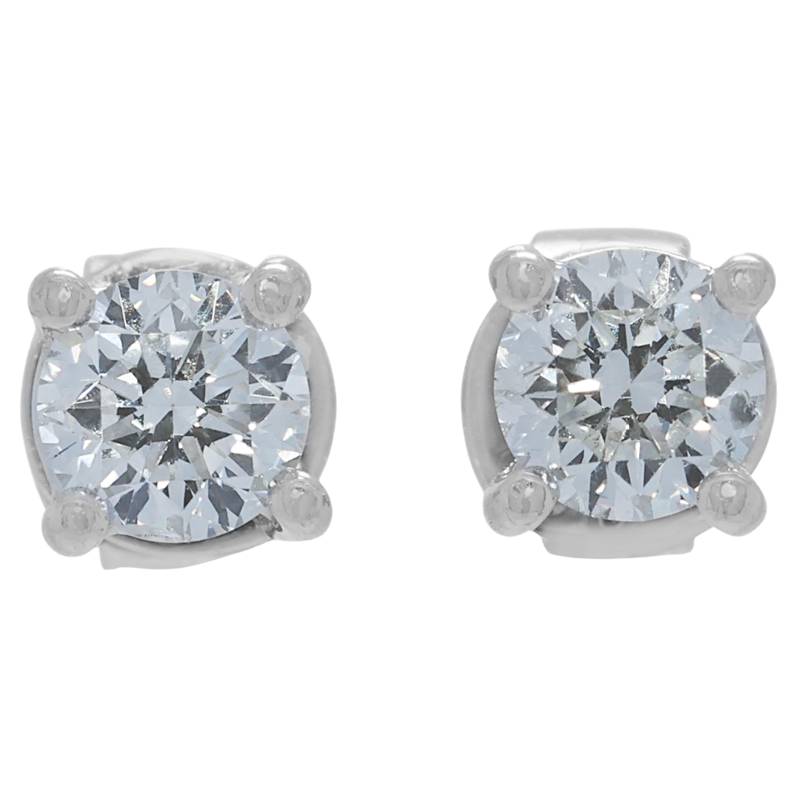 Raffinati orecchini con diamante da 0,40 carati in oro bianco 18 carati