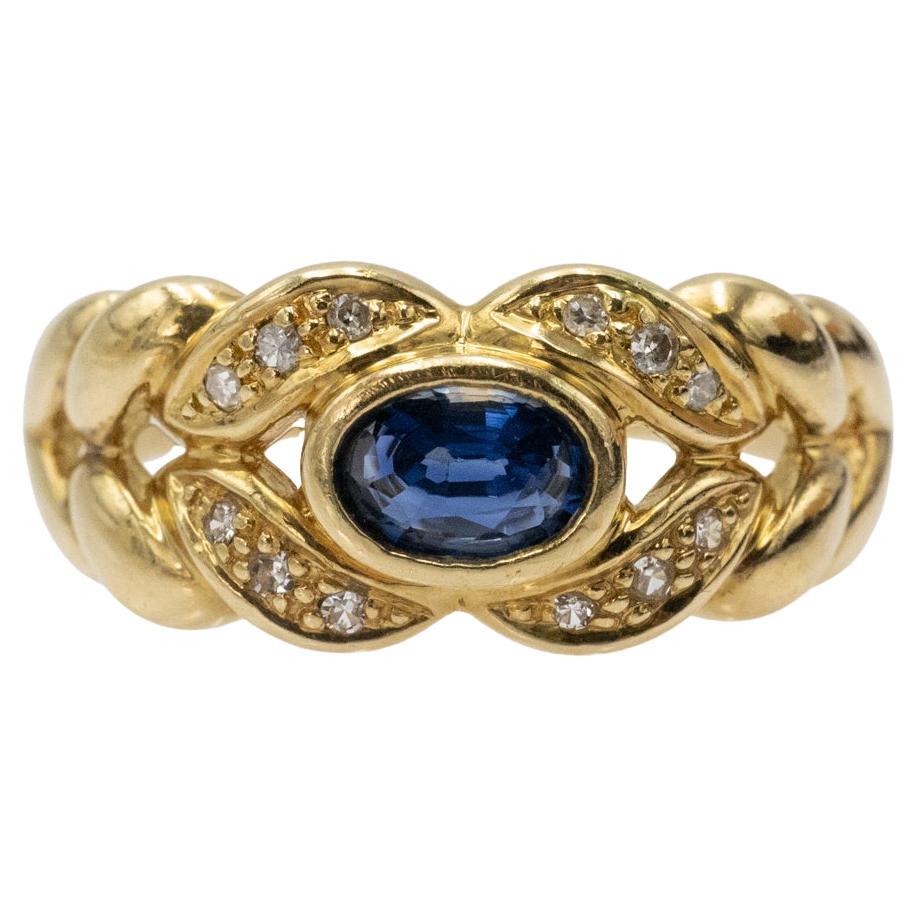 Anillo de oro refinado de 18 quilates con zafiros y diamantes, Francia.