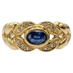 Refined 18k gold ring with sapphires and diamonds, France.