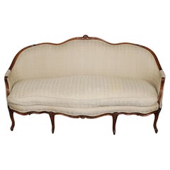 Refined and Chic French Louis XV Carved Walnut Settee Sofa Canape Circa 1920