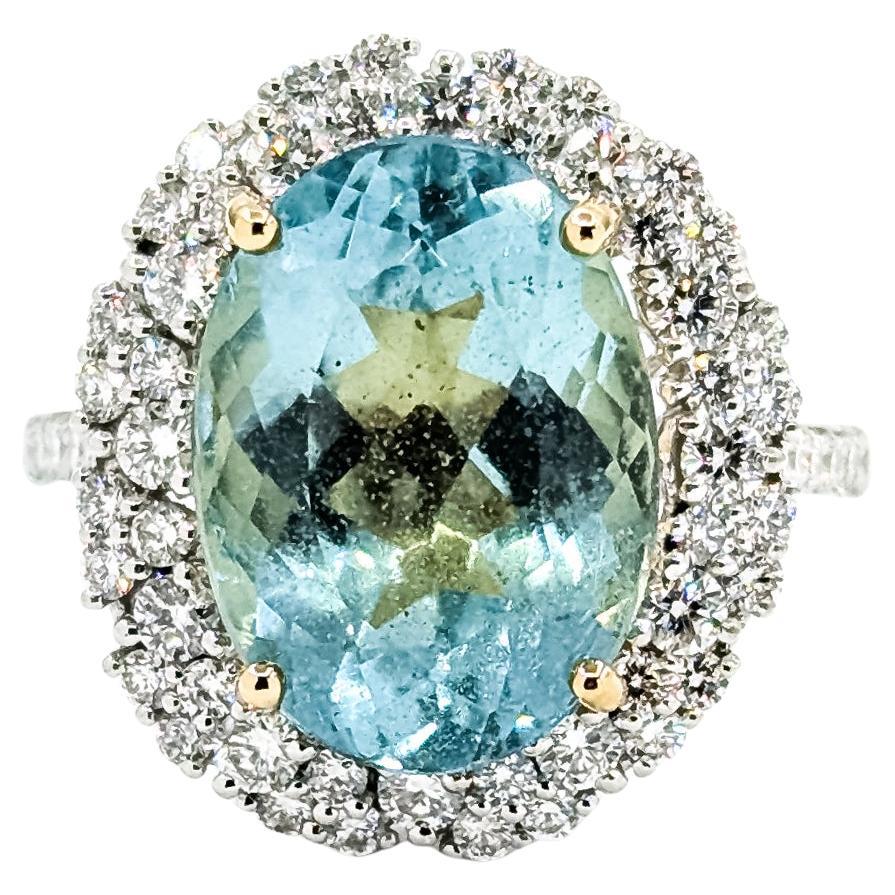 Raffinato anello con acquamarina e diamanti in platino e oro giallo 18k