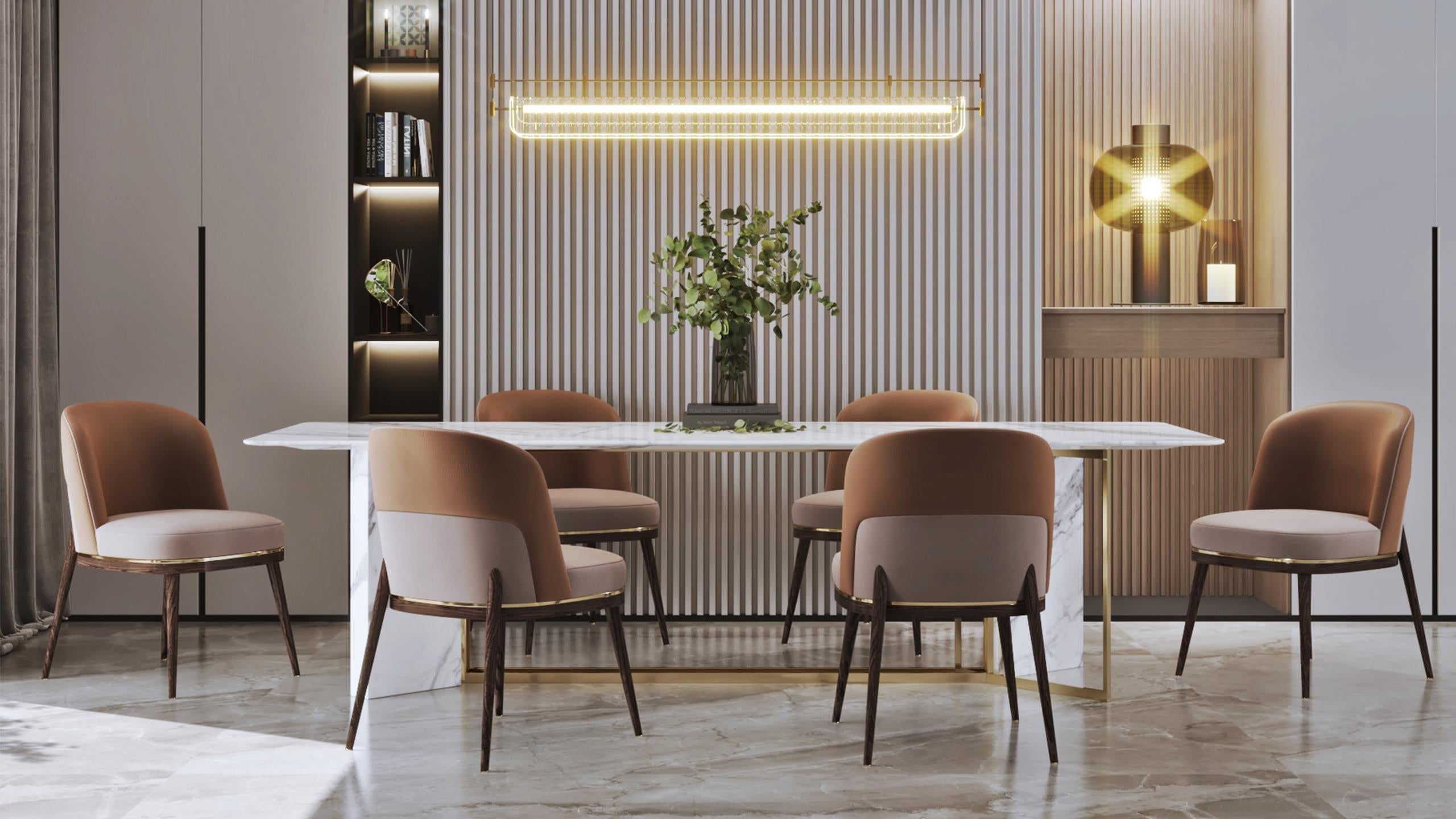 The Aria dining chair is a celebration of graceful design and refined comfort, perfectly suited for both intimate dinners and grand gatherings. Its elegantly curved backrest and slender legs create a harmonious blend of form and function, adding a