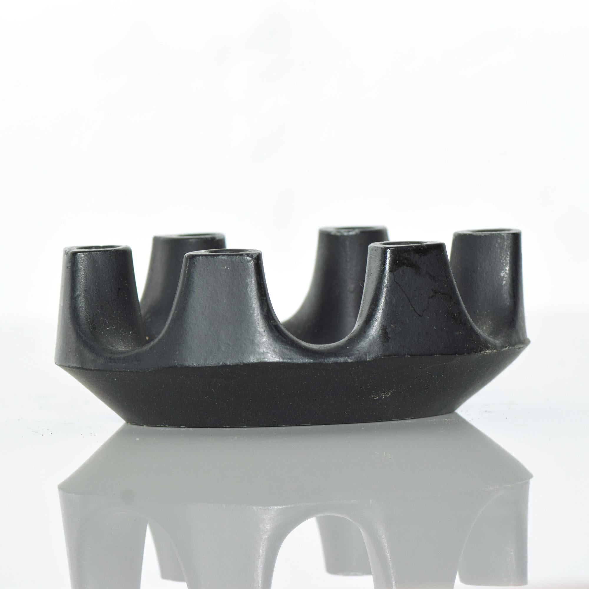 Modern refined Brutalist crown six candlestick candleholder in a sculpted iron oval ring, 1970s
Measures: 3 7/8