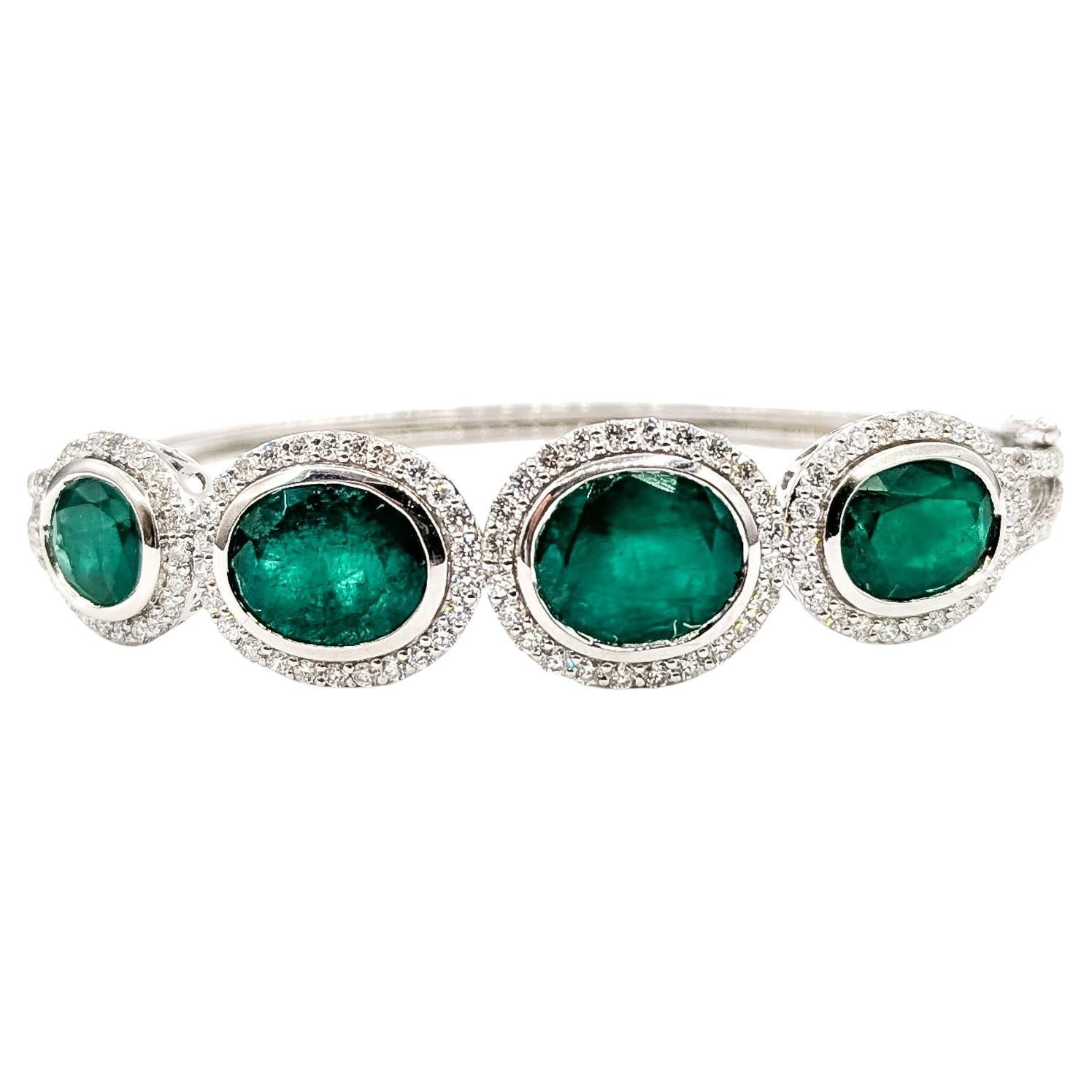 Bracelet à charnière en platine avec émeraudes et diamants