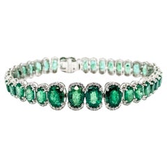 Refined Emerald Oval Link Bracelet in Platinum