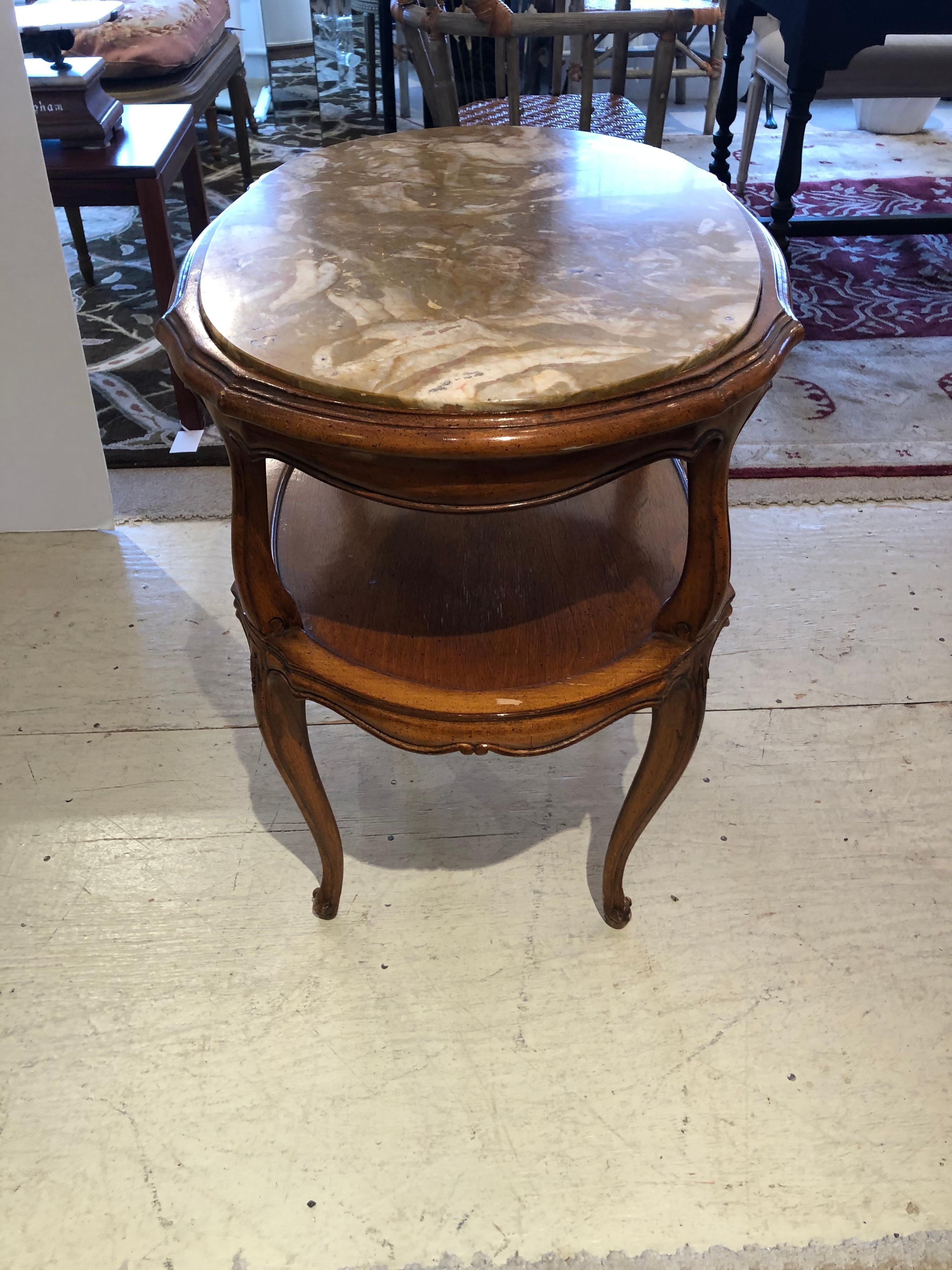 Late 20th Century Refined French Provincial Style Marble Inset Two-Tier Fruitwood Oval Side Table For Sale