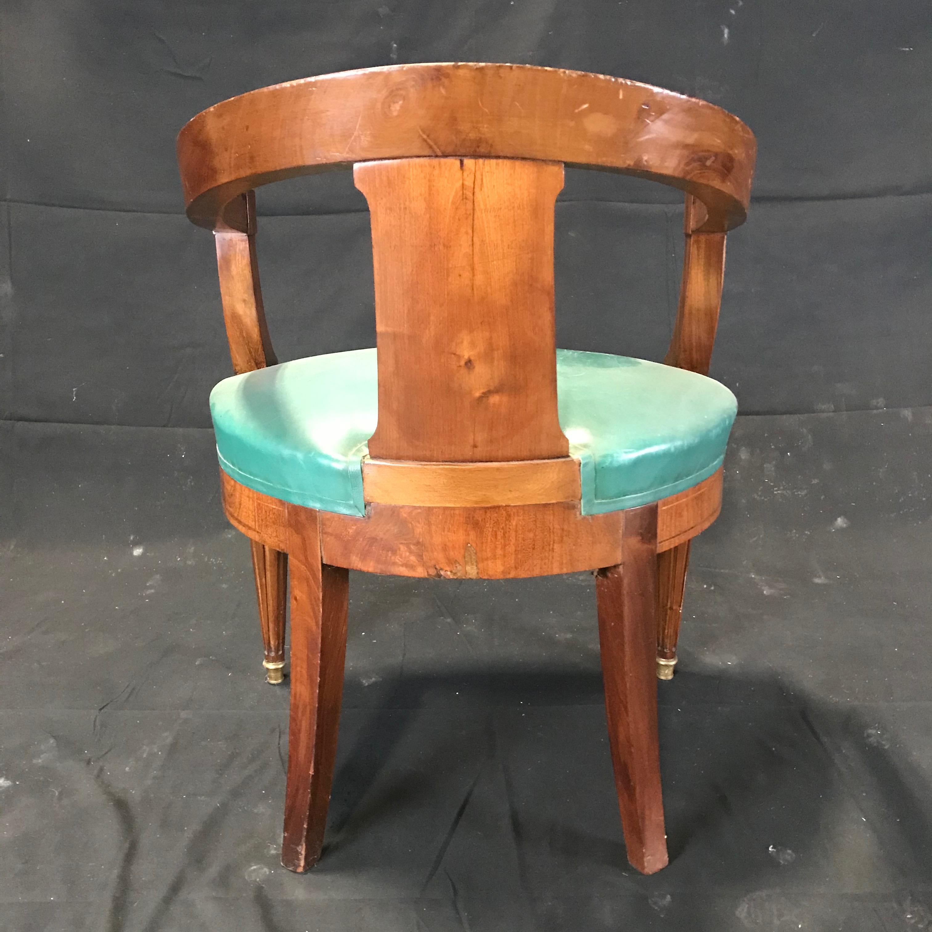 This rare French walnut Louis XVI leather desk chair has its original green leather and bronze embellishments, tapered reeded legs and wonderful curved shape.
#3802
Measures: H seat 19