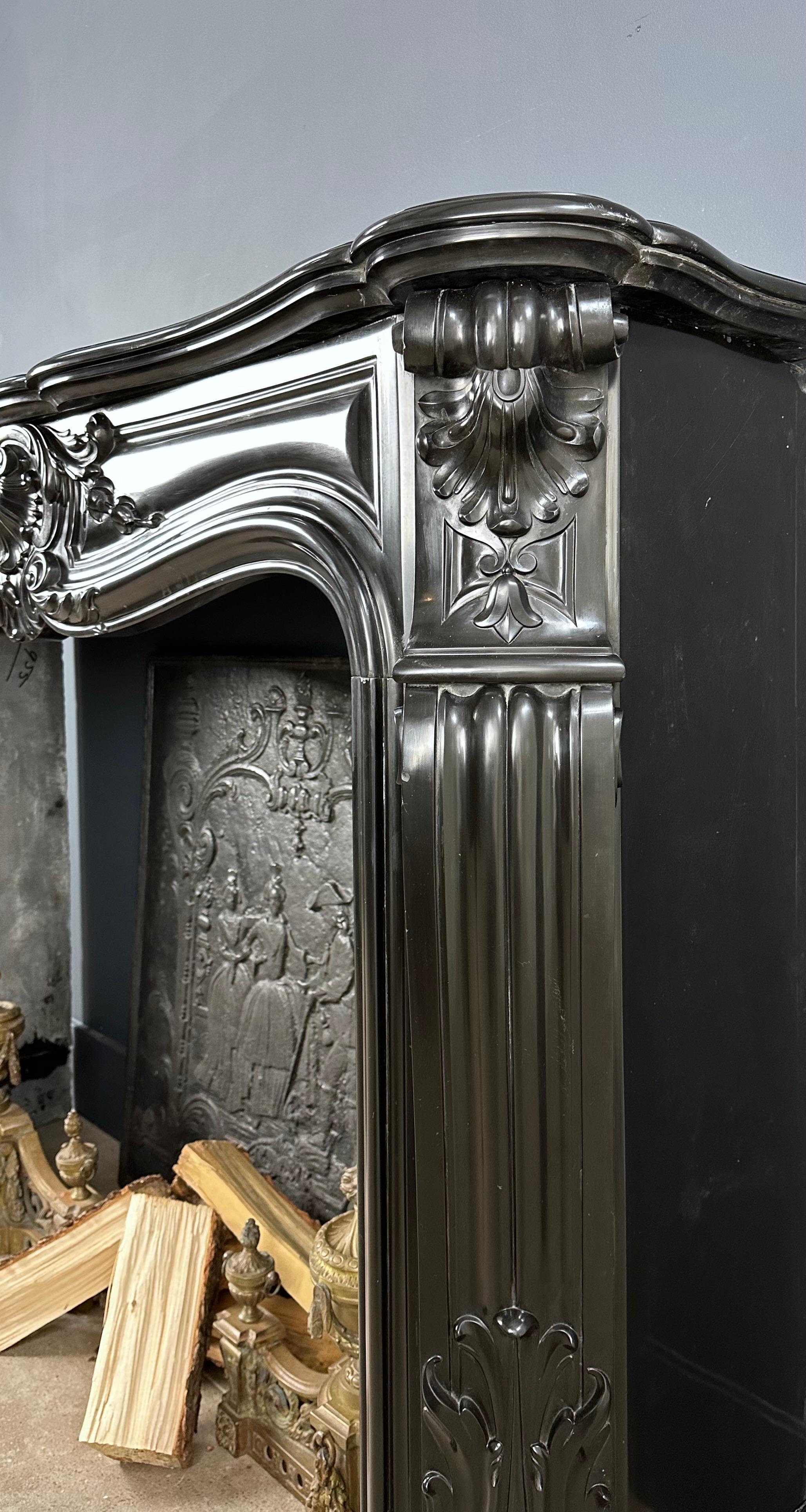 Refined Louis XV Style: Antique Marble Front Fireplace in Noir de Mazy Marble For Sale 8