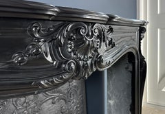 Refined Louis XV Style: Antique Marble Front Fireplace in Noir de Mazy Marble