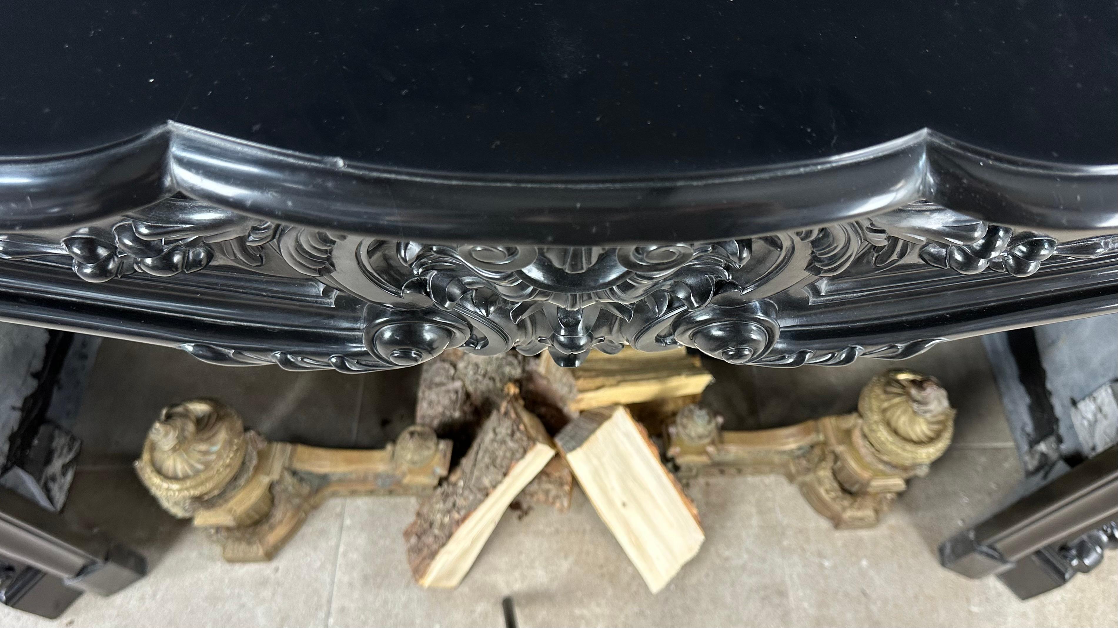 Hand-Carved Refined Louis XV Style: Antique Marble Front Fireplace in Noir de Mazy Marble For Sale