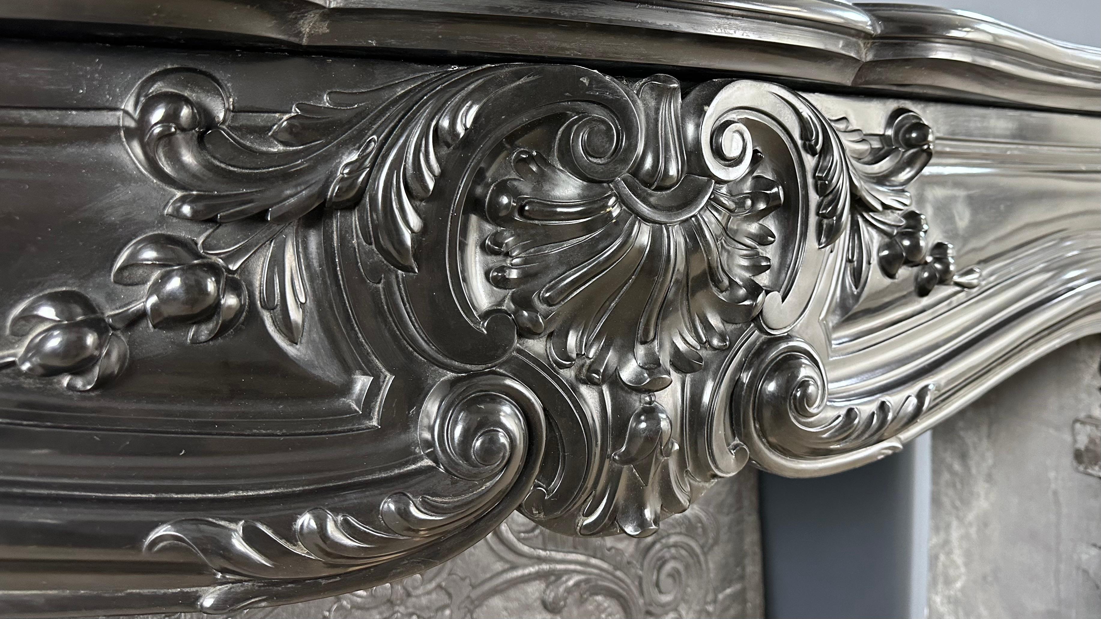 19th Century Refined Louis XV Style: Antique Marble Front Fireplace in Noir de Mazy Marble For Sale