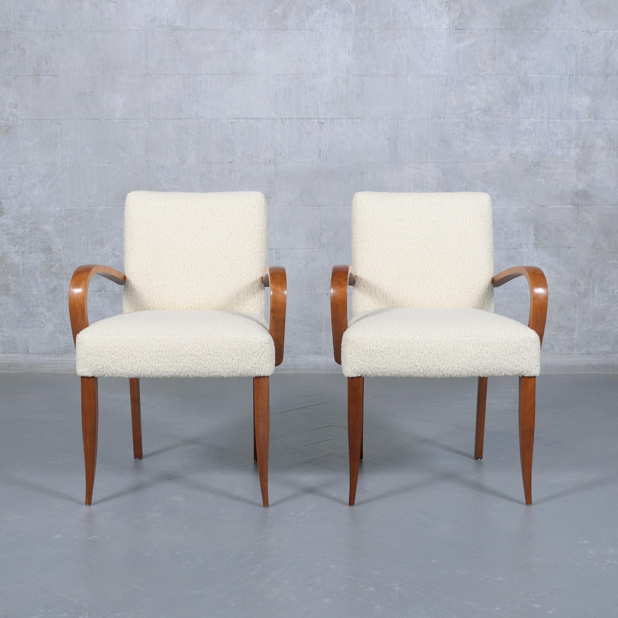 Delve into the refined elegance of our mid-century modern dining armchairs, each a symbol of expert craftsmanship and timeless design. Crafted from premium walnut, these two chairs have been meticulously restored by our skilled artisans, surpassing