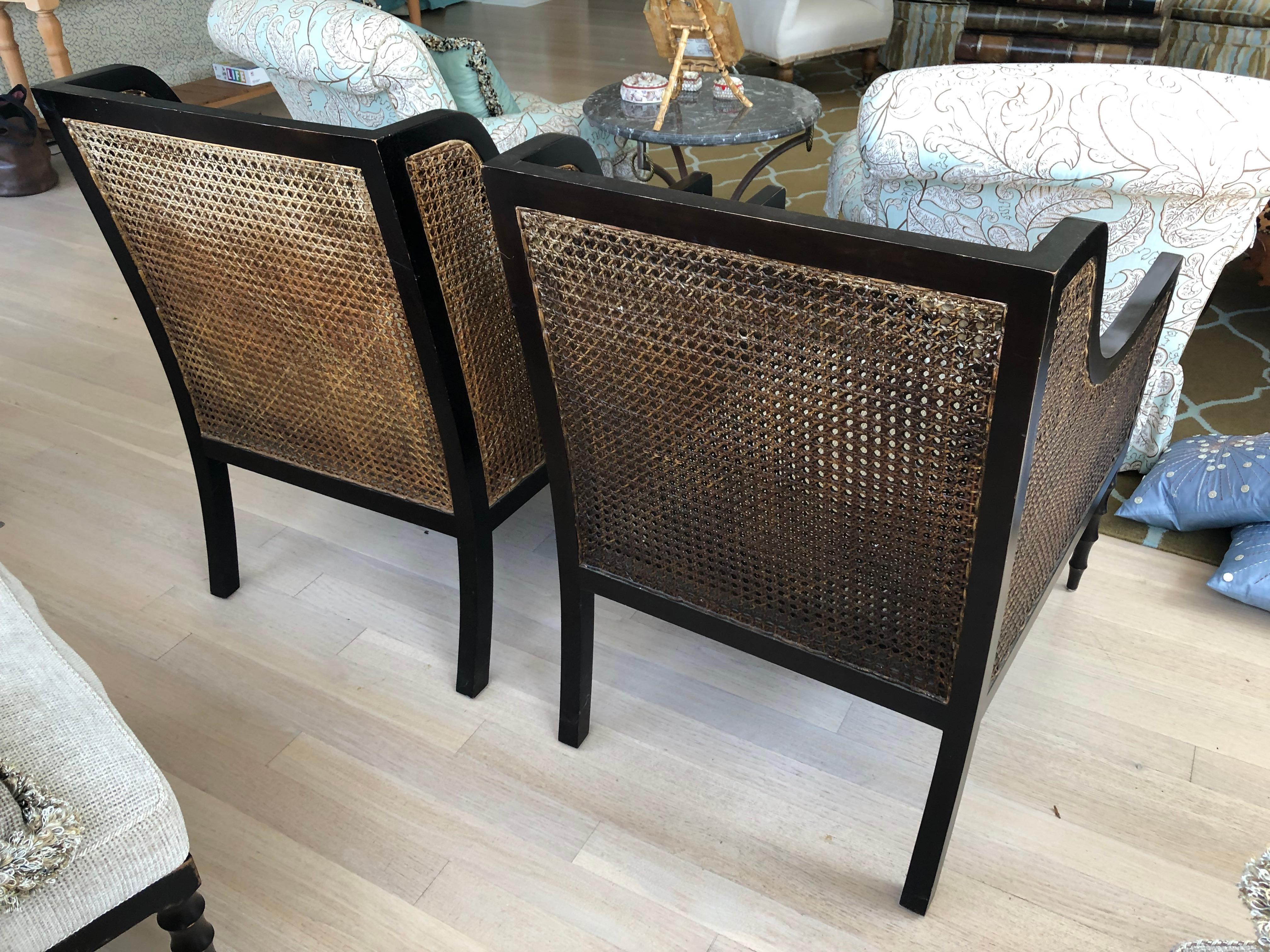 Refined Pair of Ebonized Double Caned Upholstered Club Chairs and Ottomans 3