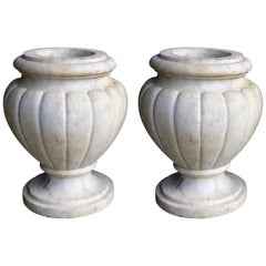 Refined Pair of Italian Neoclassical Style Carved Carrera Marble Lobed Urns