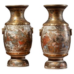 REFINED set of GILT SATSUMA vases, in a baluster shape stoneware with figures