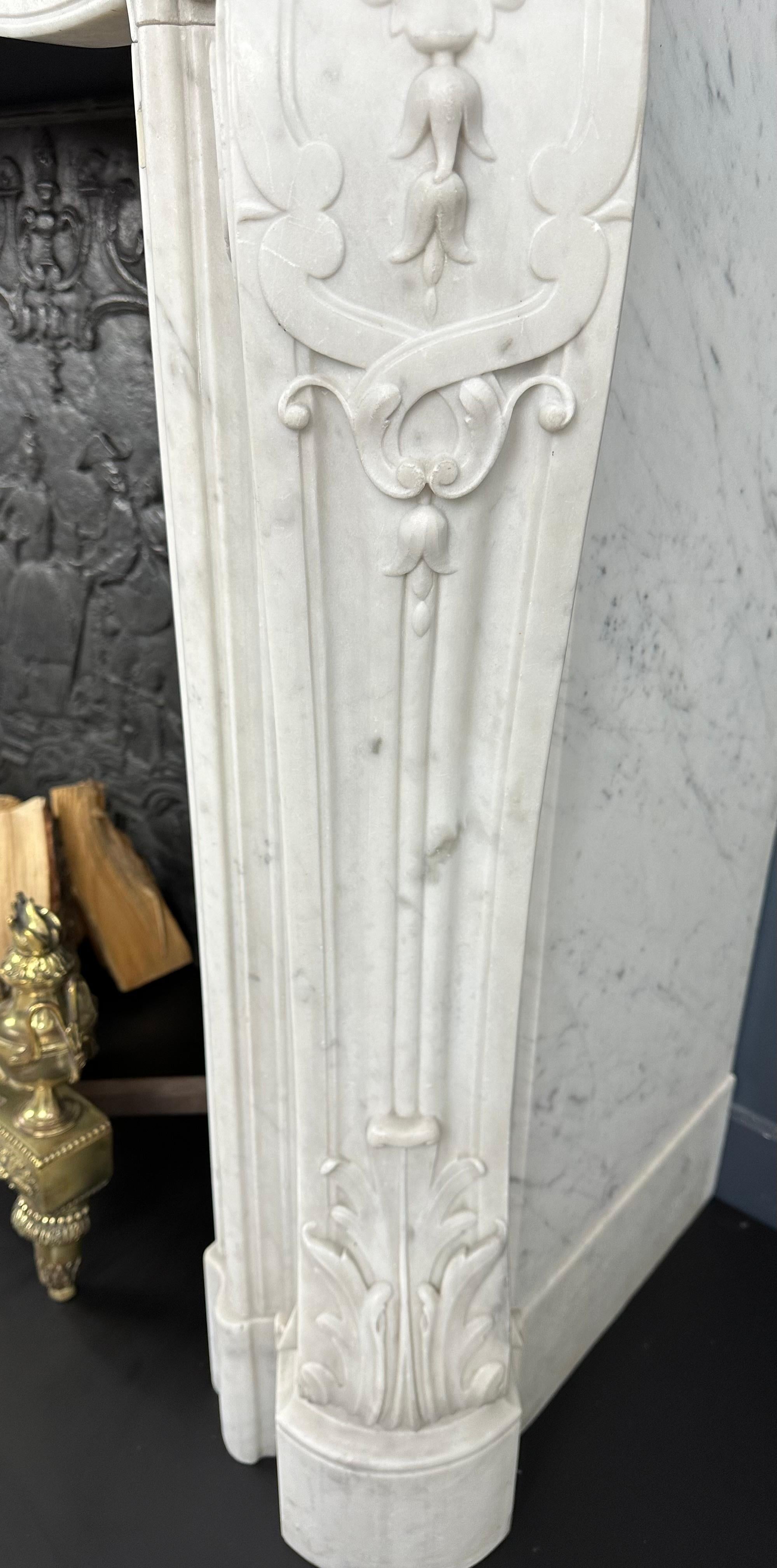 Refined Splendor: Exclusive Antique Louis XV Carrara White Marble Fireplace For Sale 7