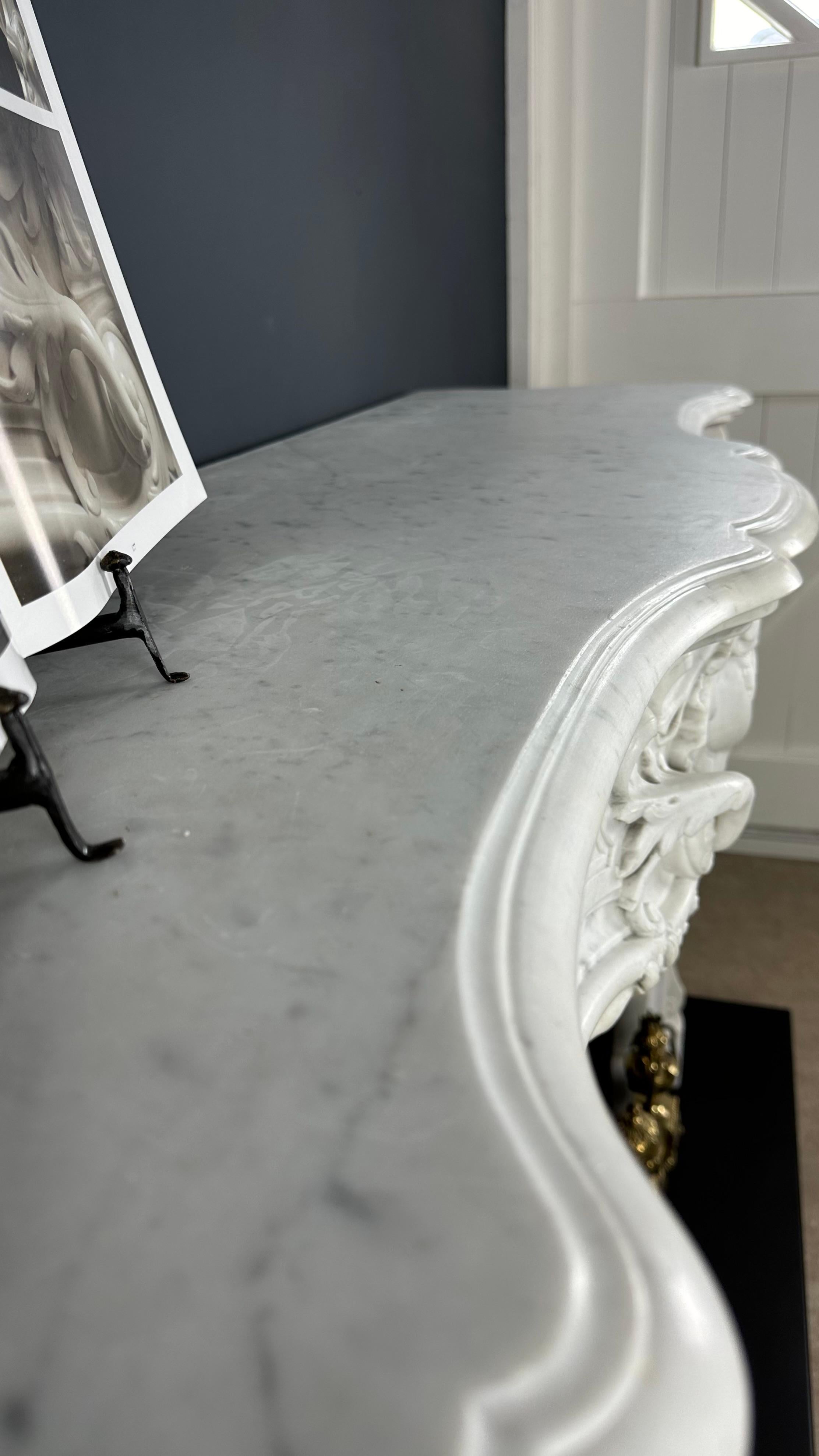 19th Century Refined Splendor: Exclusive Antique Louis XV Carrara White Marble Fireplace For Sale