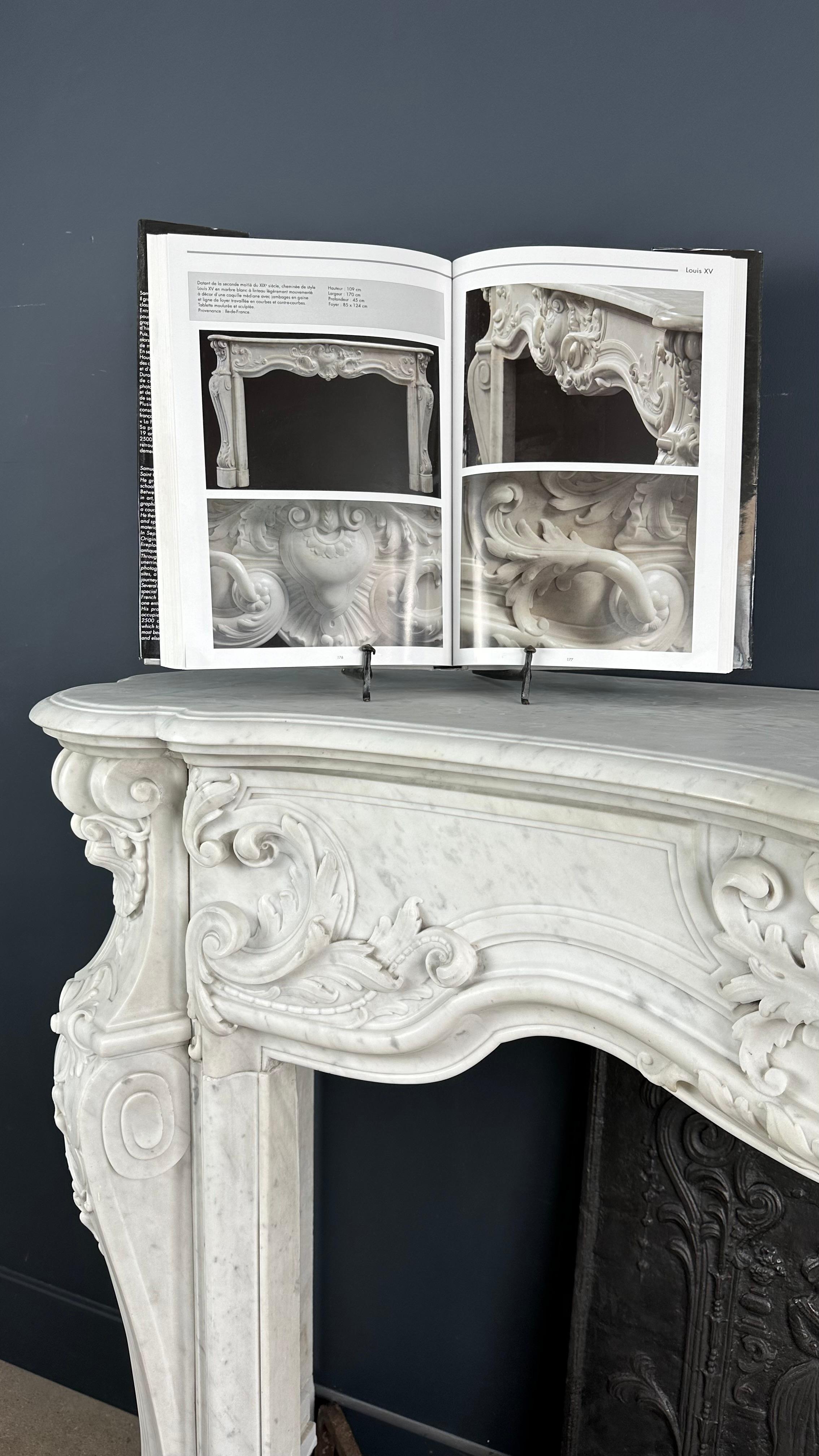 Refined Splendor: Exclusive Antique Louis XV Carrara White Marble Fireplace For Sale 1