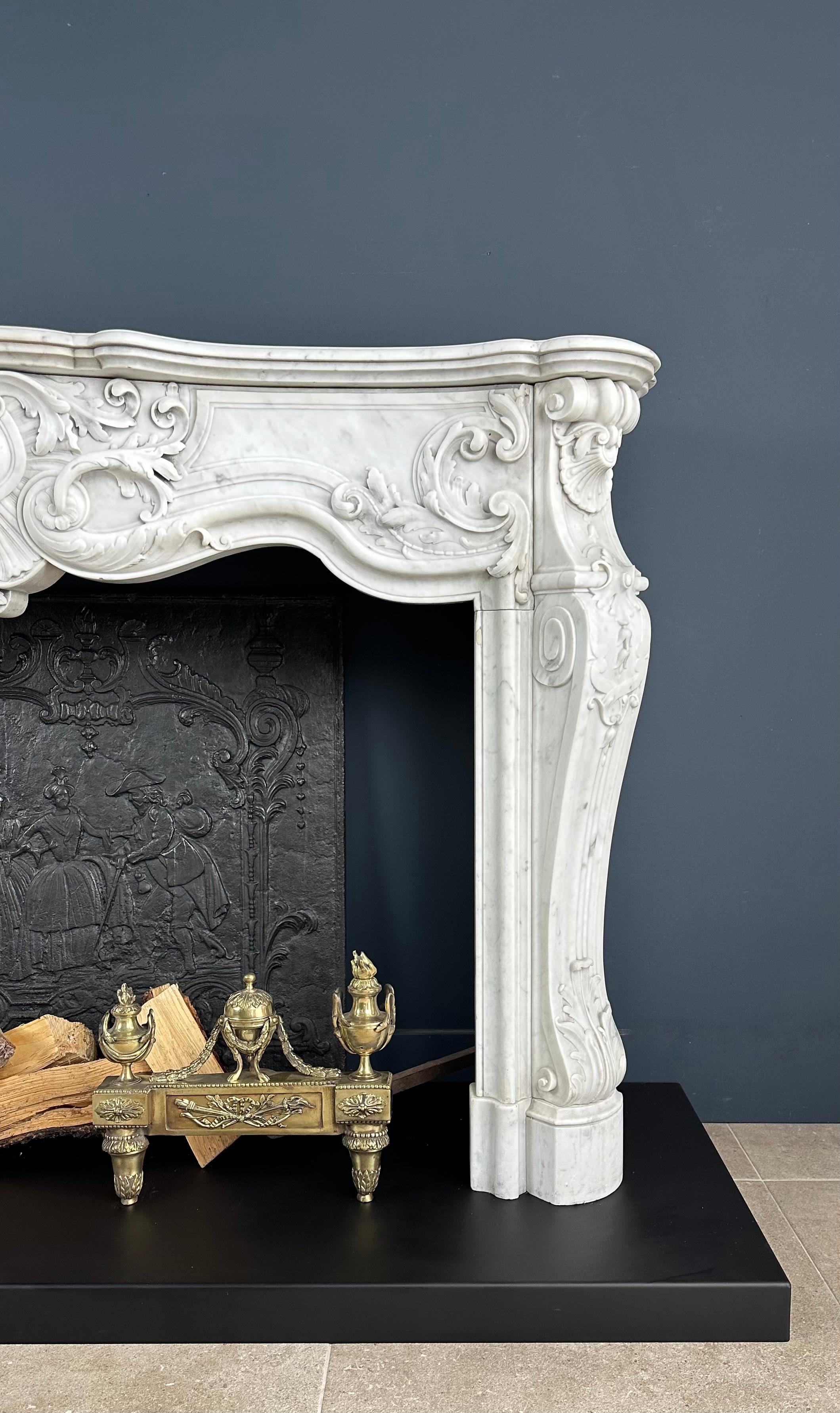 Refined Splendor: Exclusive Antique Louis XV Carrara White Marble Fireplace For Sale 2