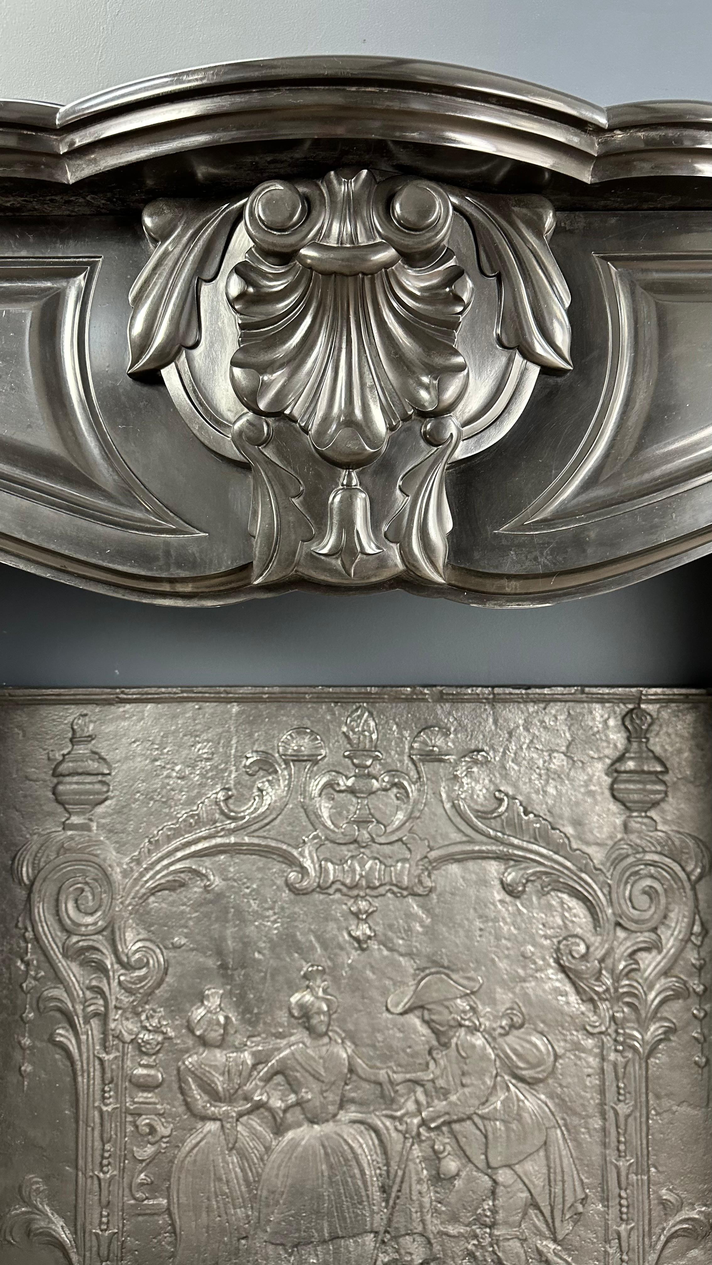 Refined Splendor: Louis XV Style Noir de Mazy Antique Marble Front Fireplace For Sale 1