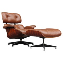 Silla de salón de palisandro y cuero con acabado Charles and Ray Eames para Herman Miller