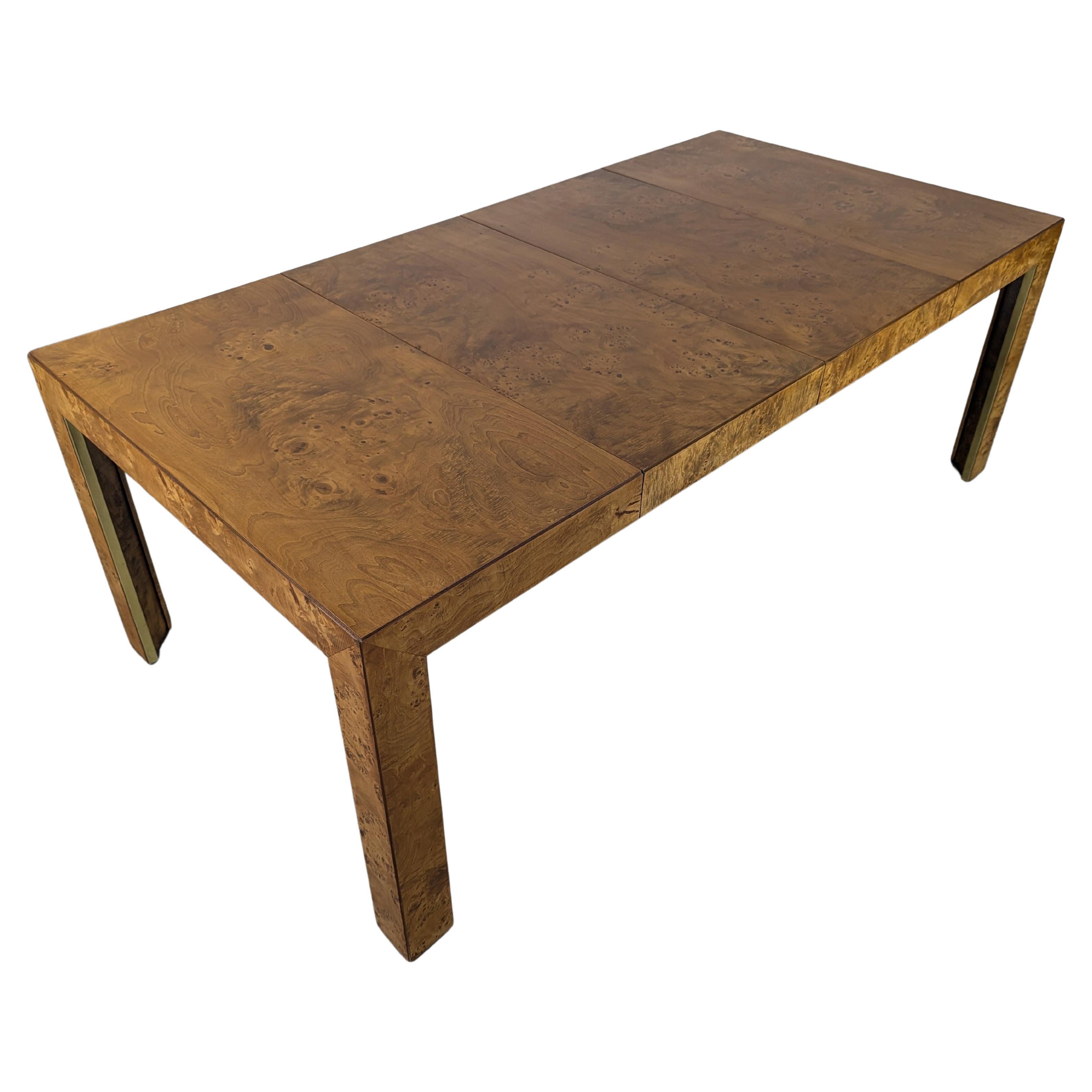 Elevate your dining experience with this exquisite Mid Century Burlwood Extendable Dining Table by Thomasville, meticulously refinished for a stunning, timeless appeal. Crafted in 1977, this vintage dining table showcases the unparalleled